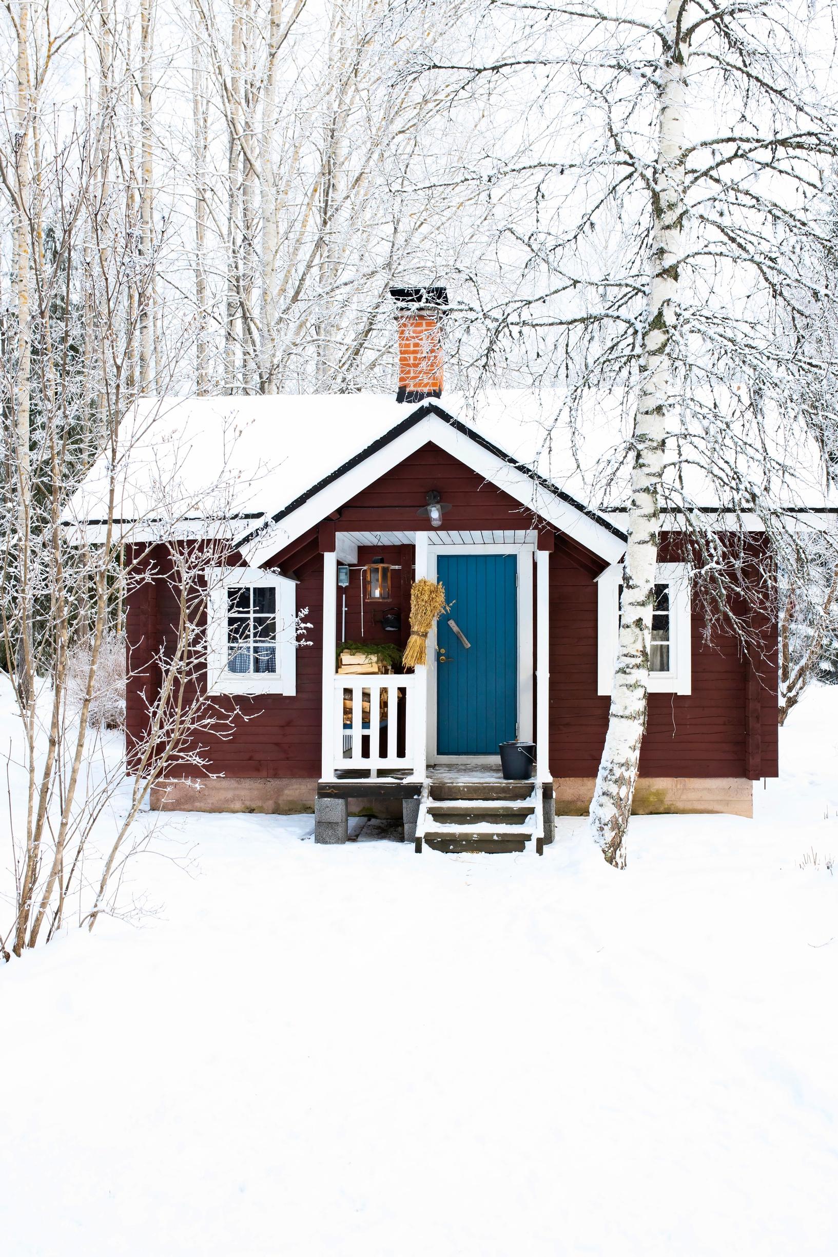 Sauna cabin painted with red ochre paint