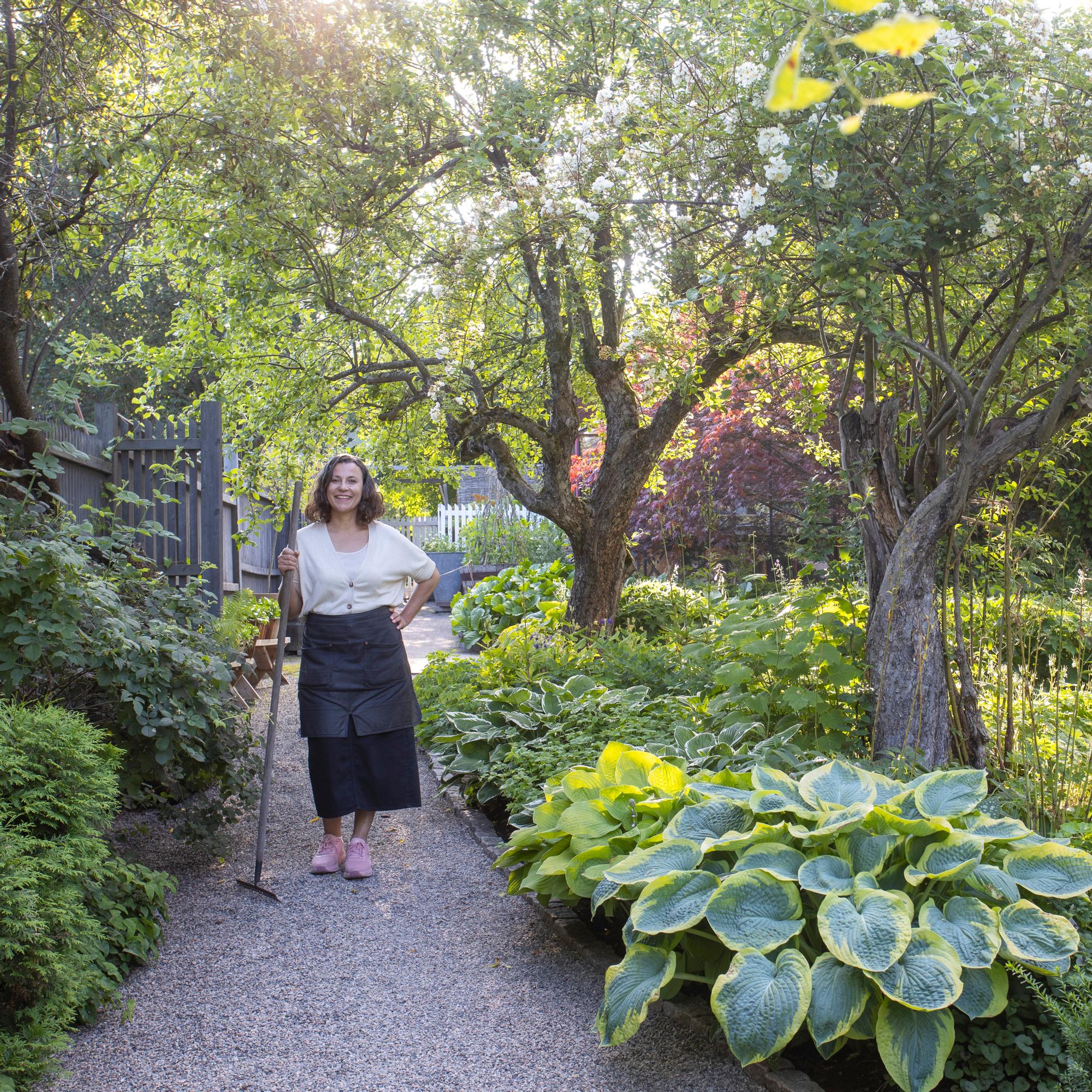 Charlotte ditched her lawn and created a garden so spectacular it became a visitor attraction—and her new job