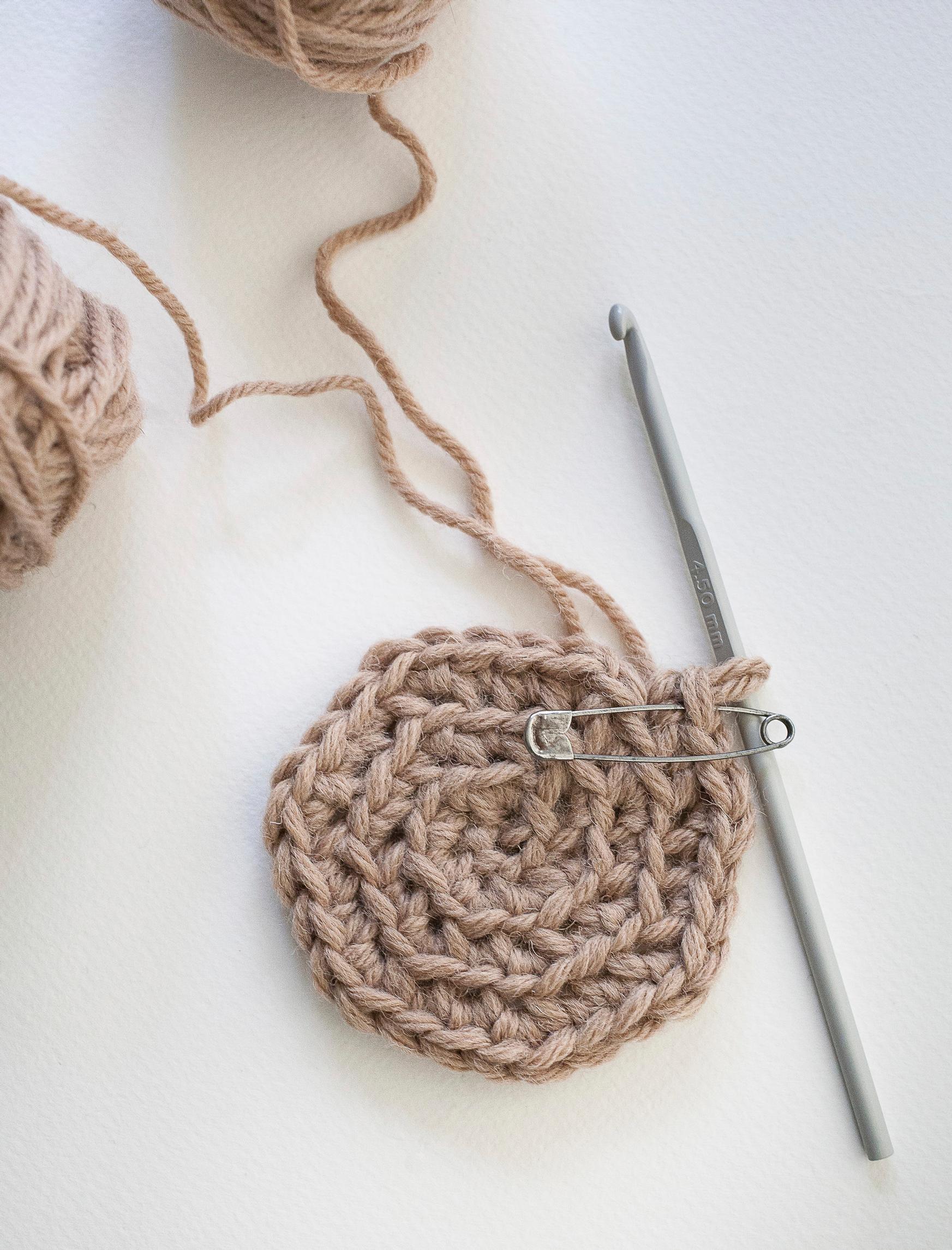 Crocheted fringe rug safety pin