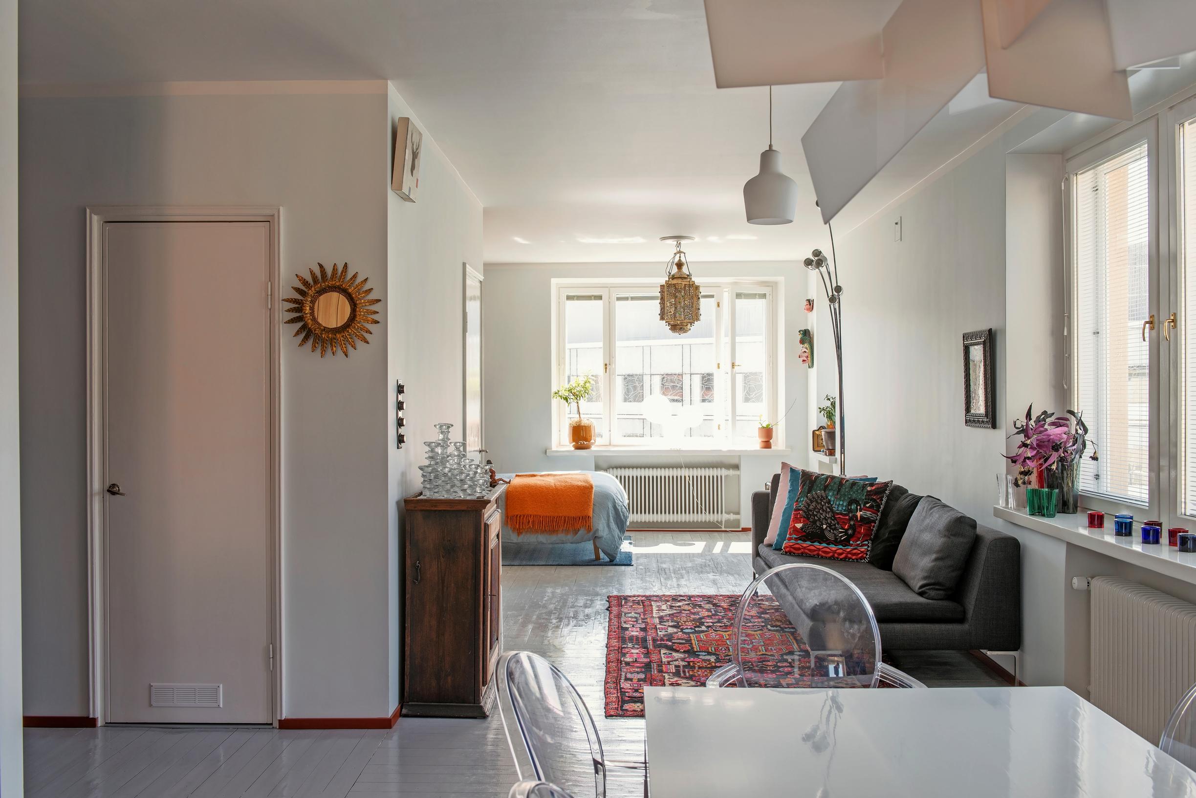 A small living room with a plank floor.