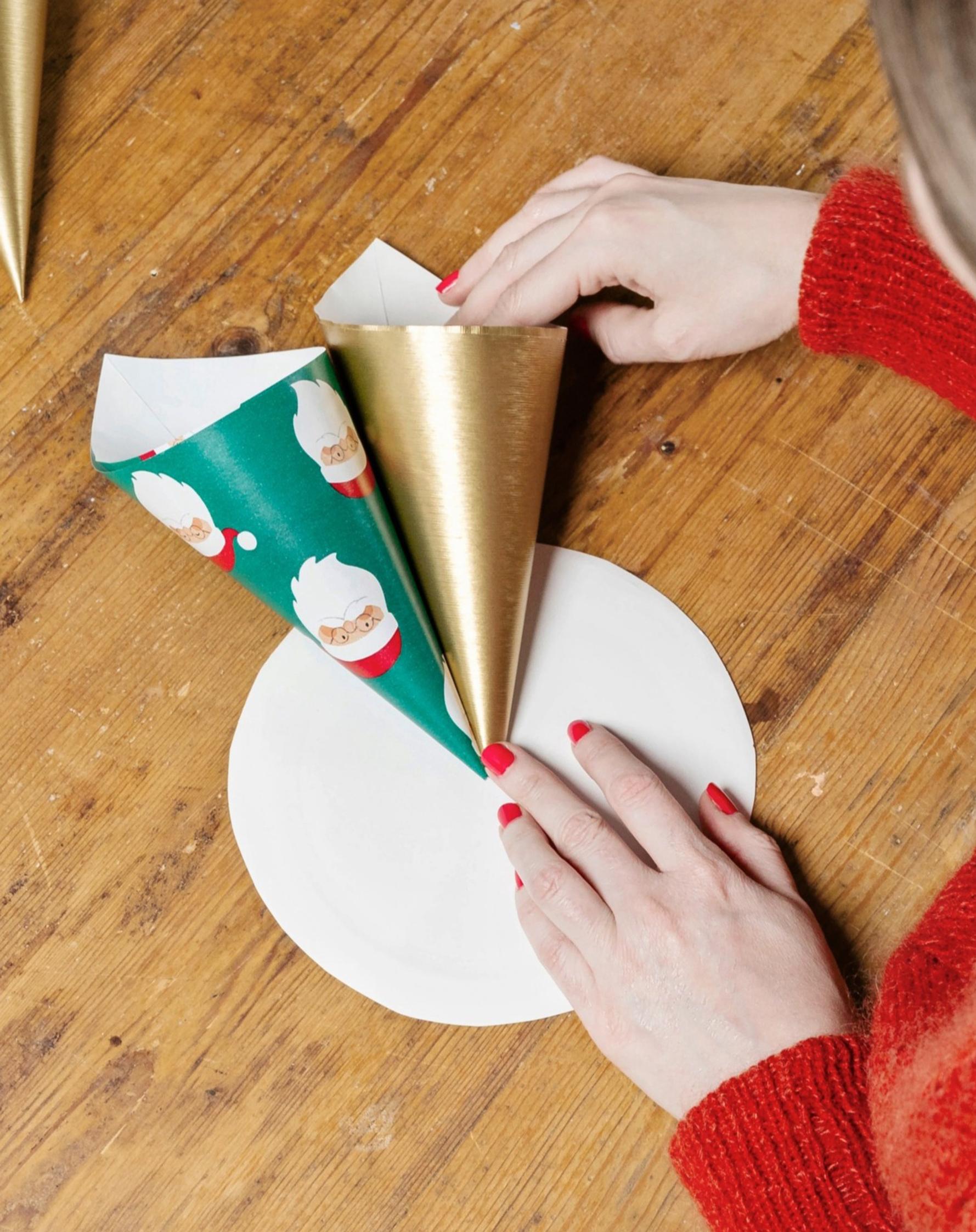 Attaching the paper cones to the backing