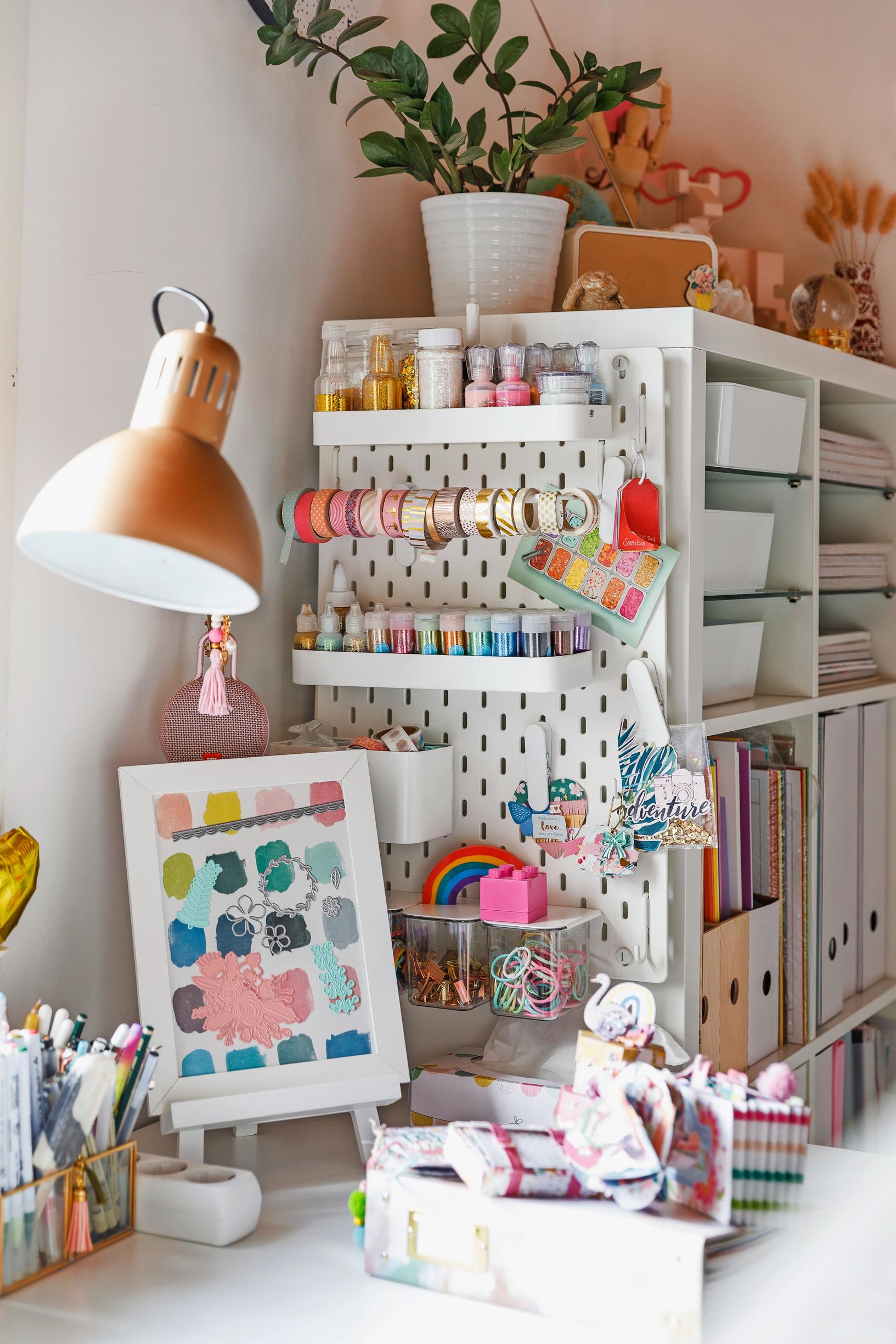 Craft enthusiast Maija Männistö’s scrapbooking table and organizer shelf.