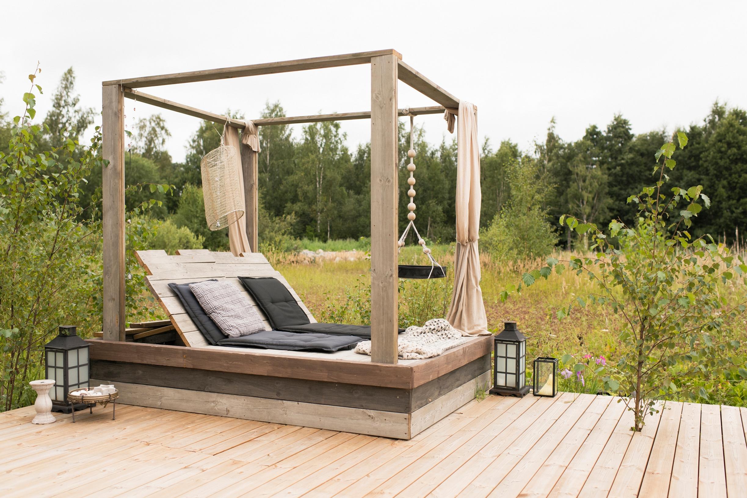 A sun lounger built from reclaimed wood