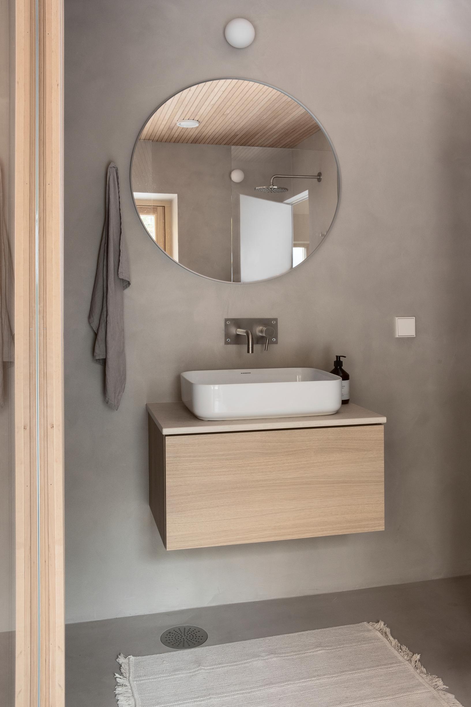 Vessel sink and oak vanity unit