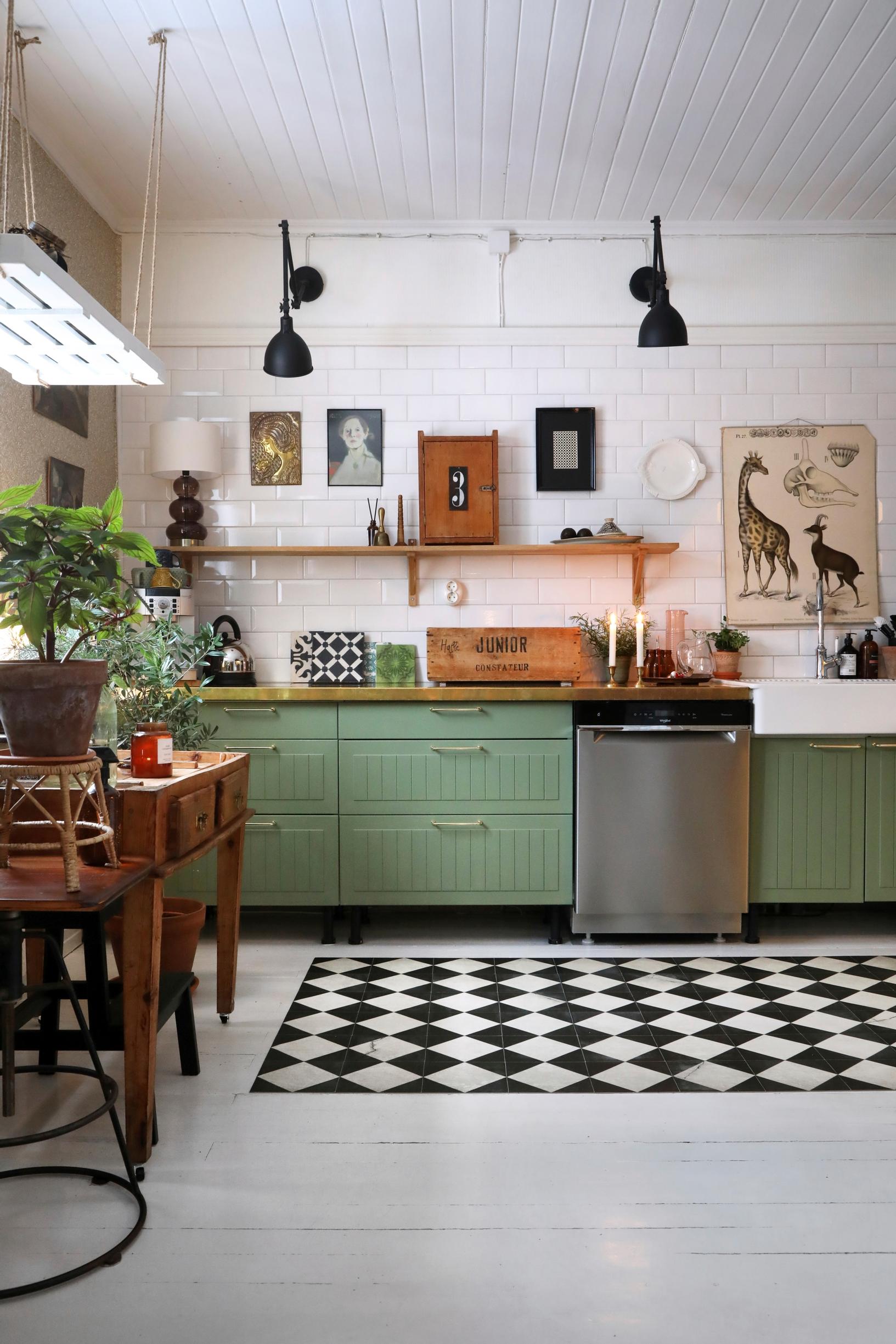 In this 1940s house, the color palette includes earthy greens and browns