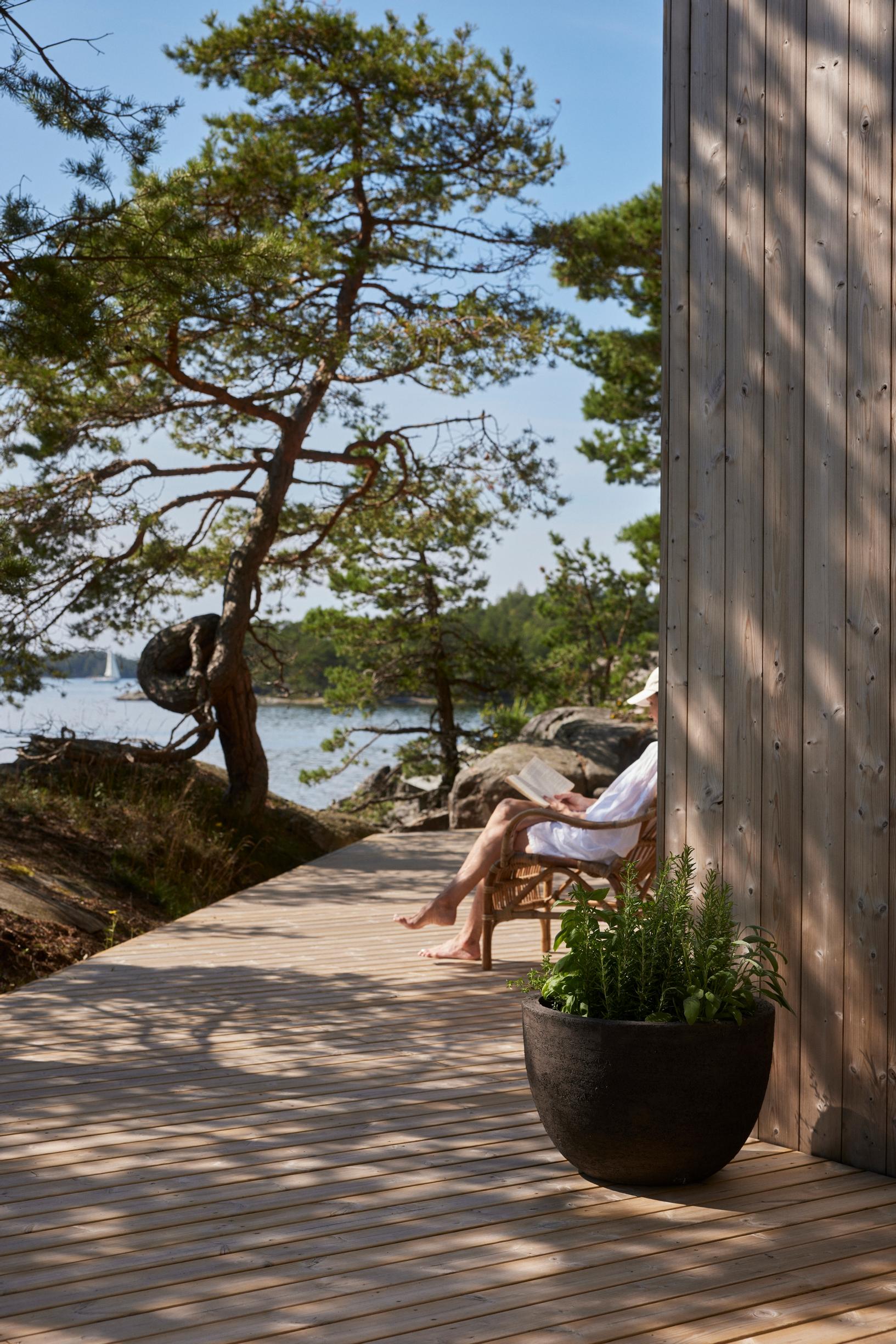 Sikke on the seaside terrace under the pines.