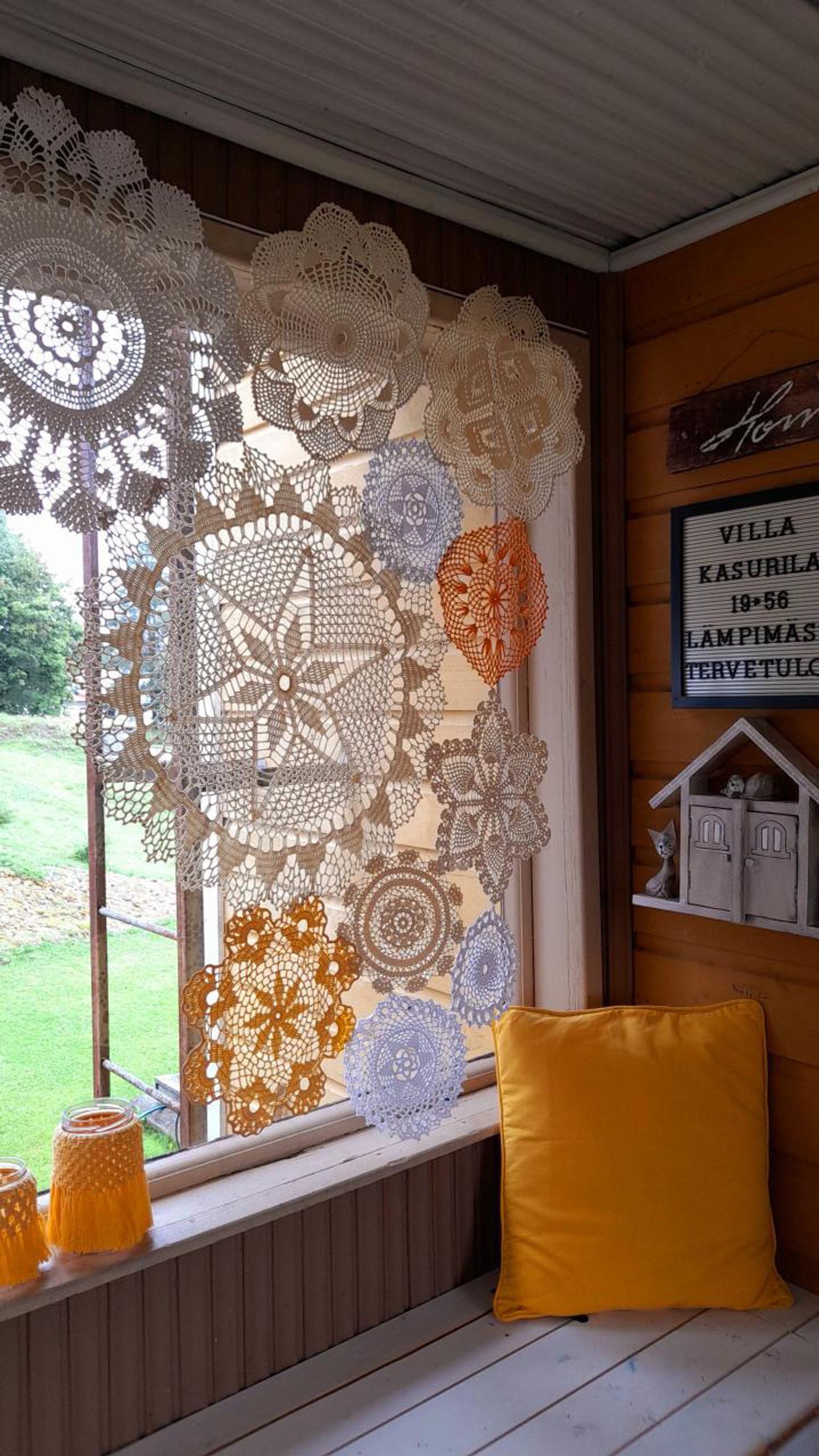A starched curtain made of old lace doilies for the house’s porch.