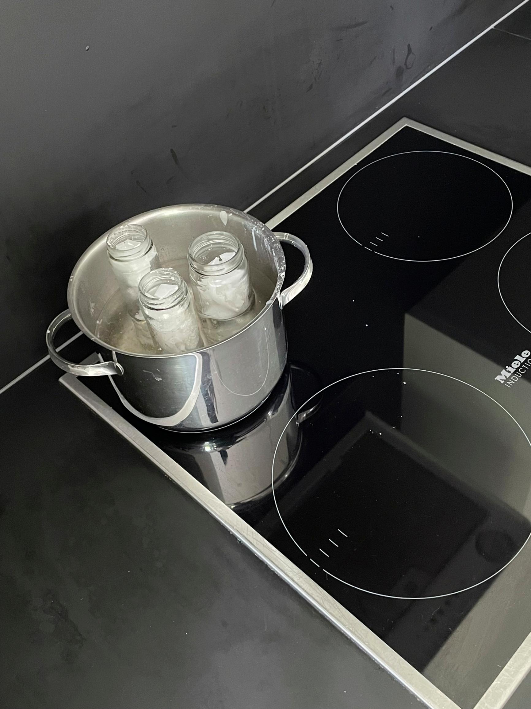 Melting candle scraps into new wax