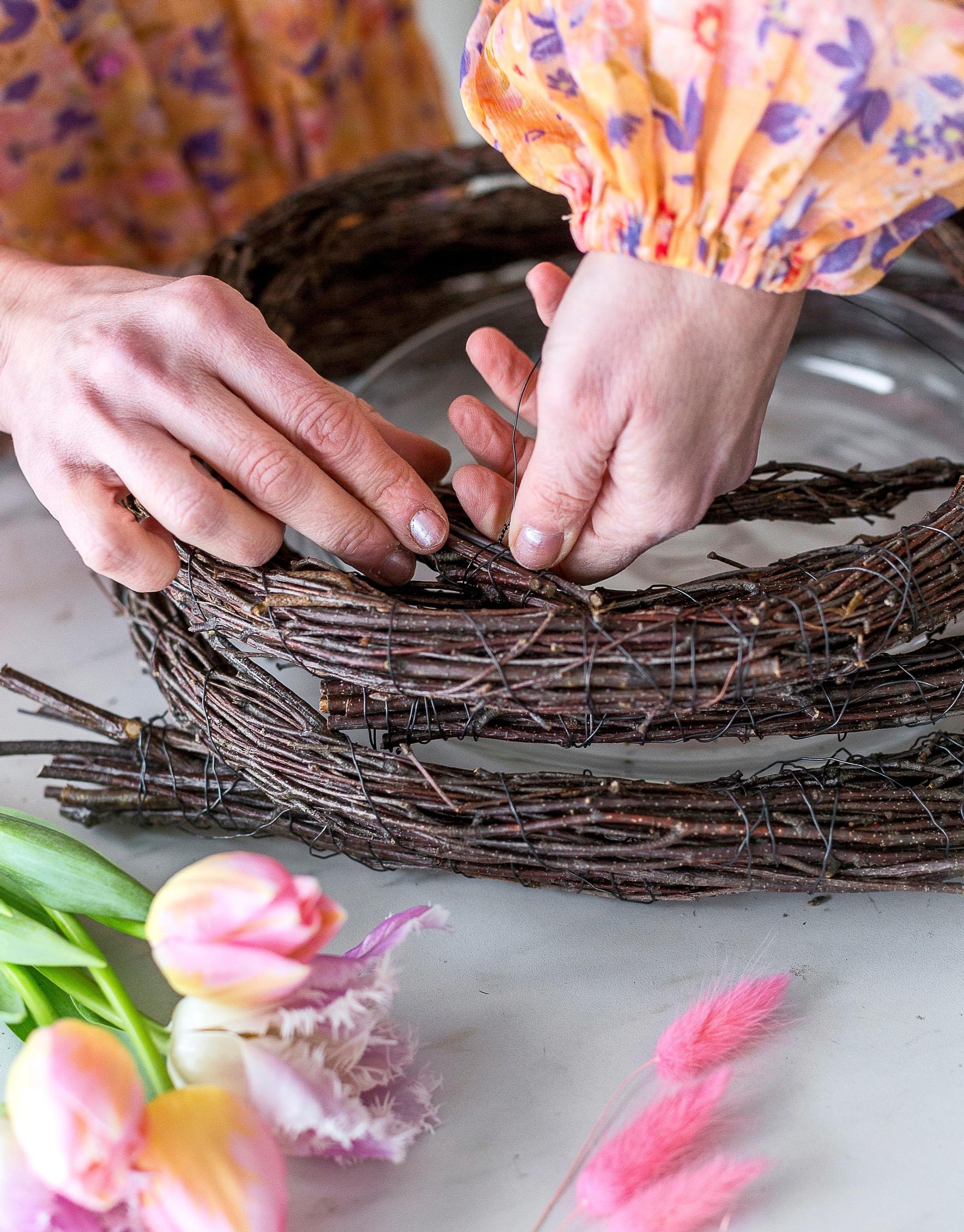 A wreath base made from twigs.