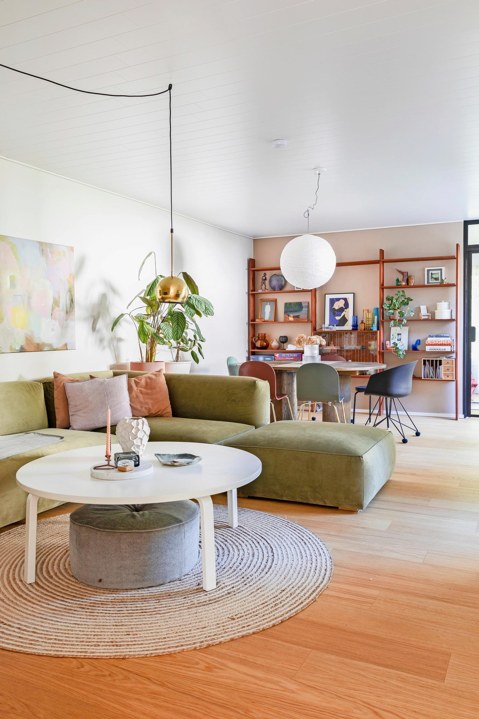 Photo of the living room in a 1960s row house featuring vintage furniture.