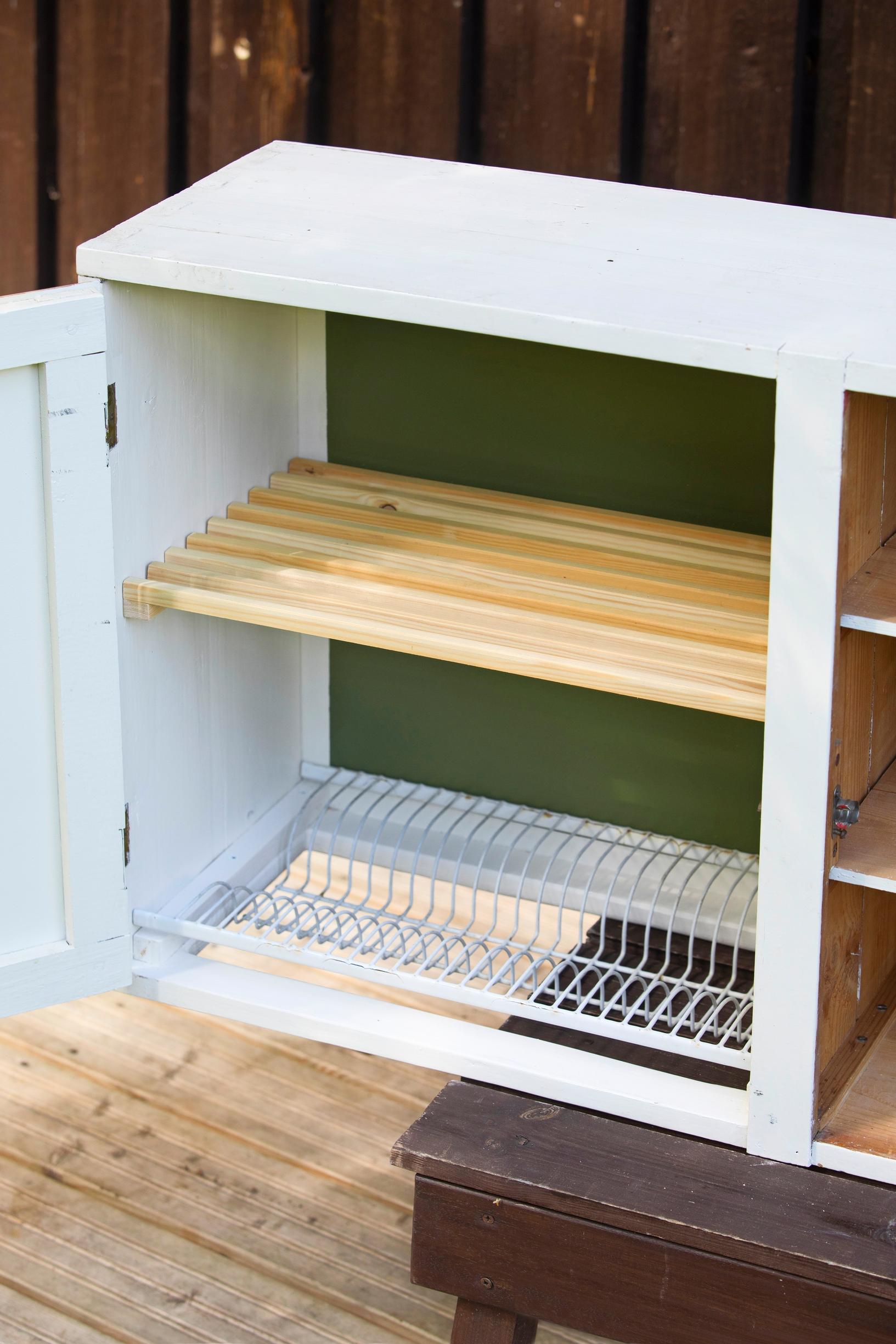 Attaching shelves to the dish-drying cabinet