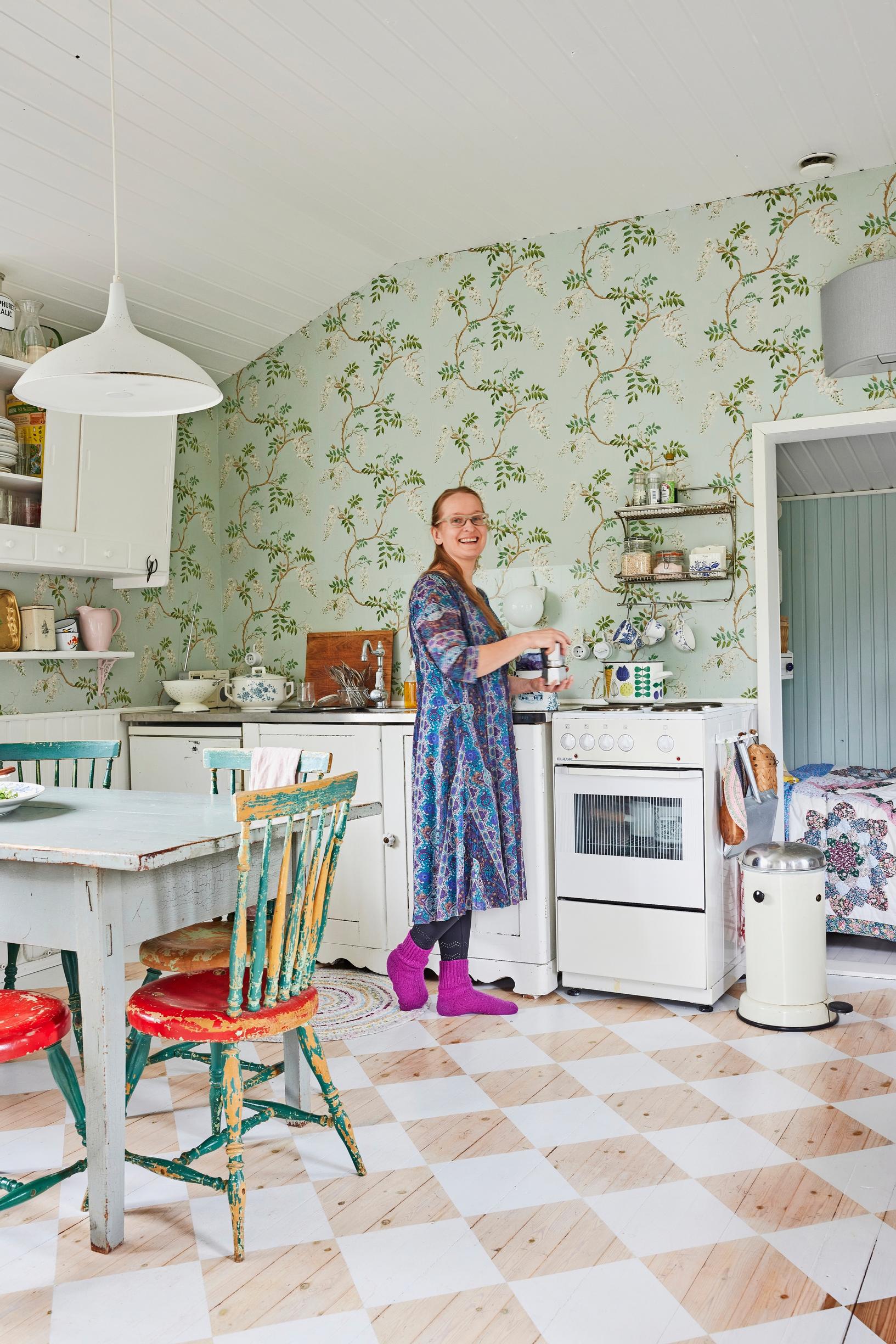 Satu Koivisto in the cottage’s main room