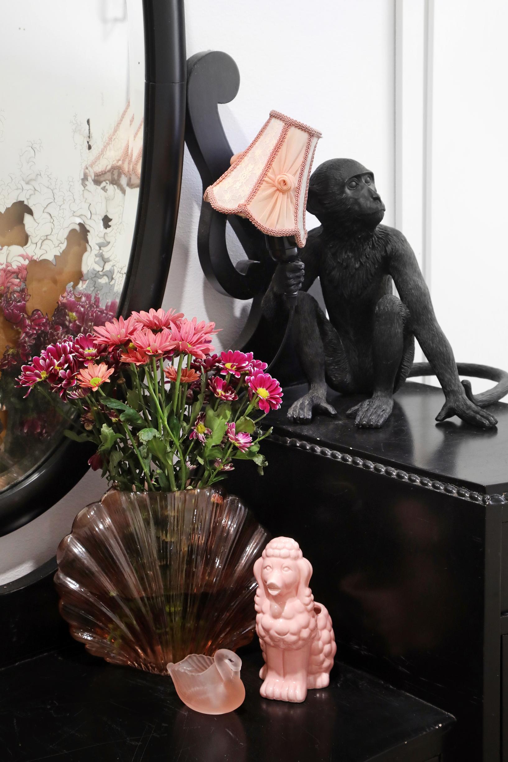 Black monkey lamp on the vanity table