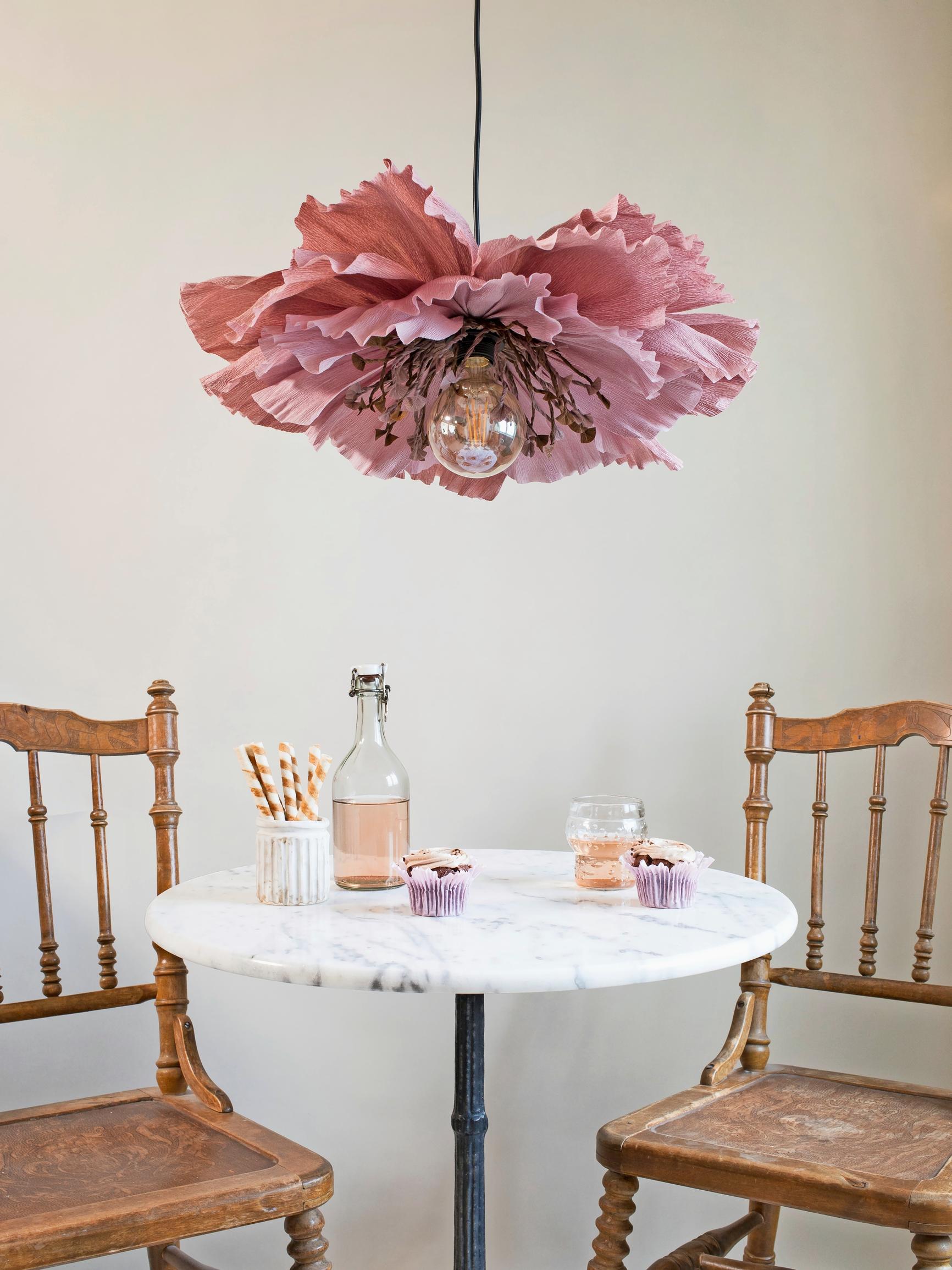 Oh, how lovely! Create a giant, trendy flower lamp from crepe paper