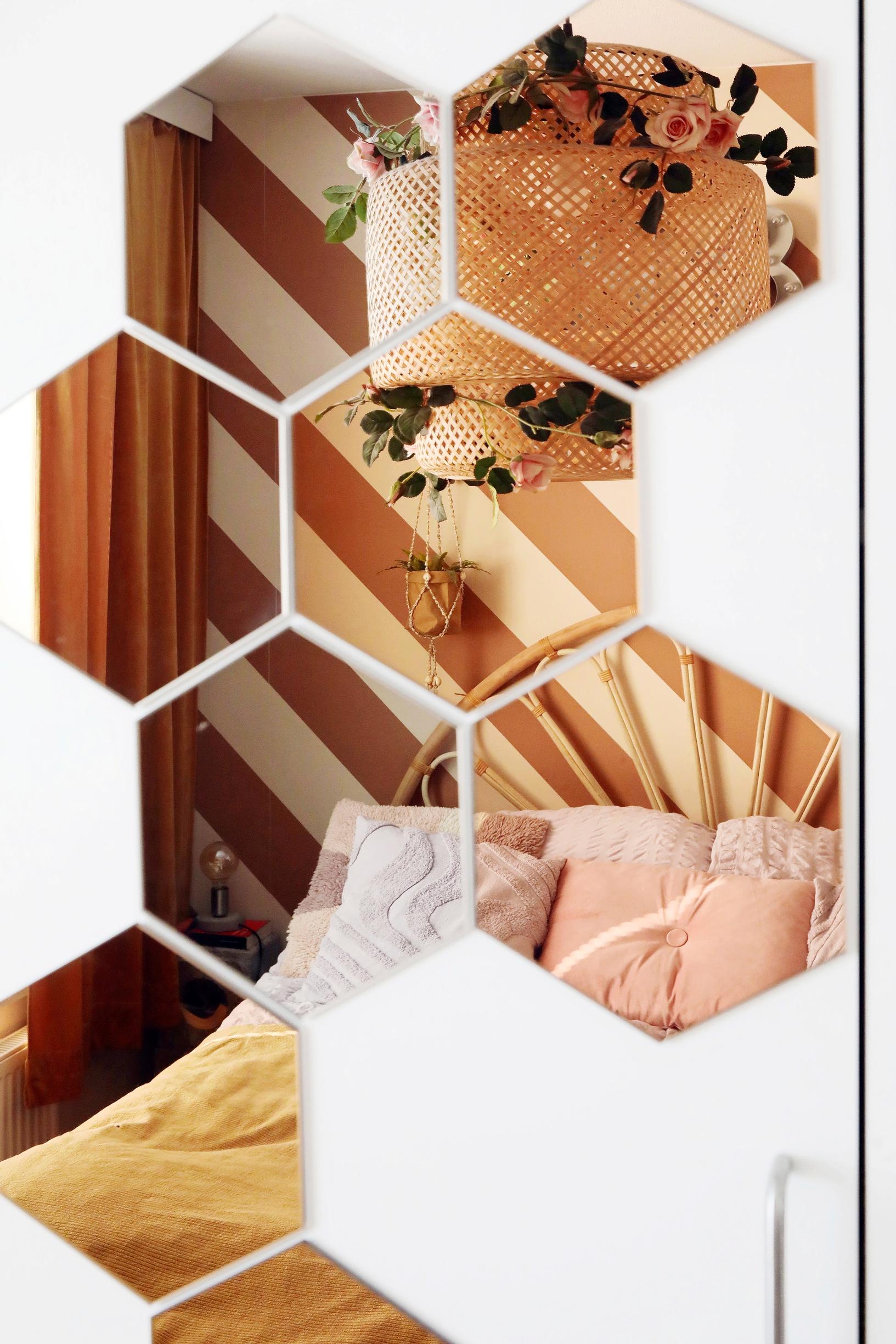 Hexagonal tile mirrors on the wall