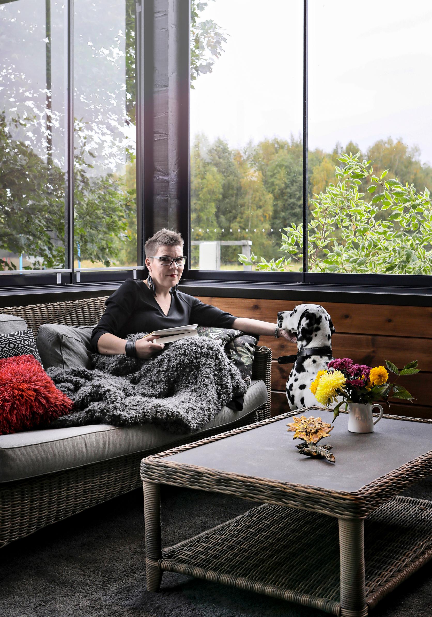 Maria Lassila-Merisalo on her home’s terrace