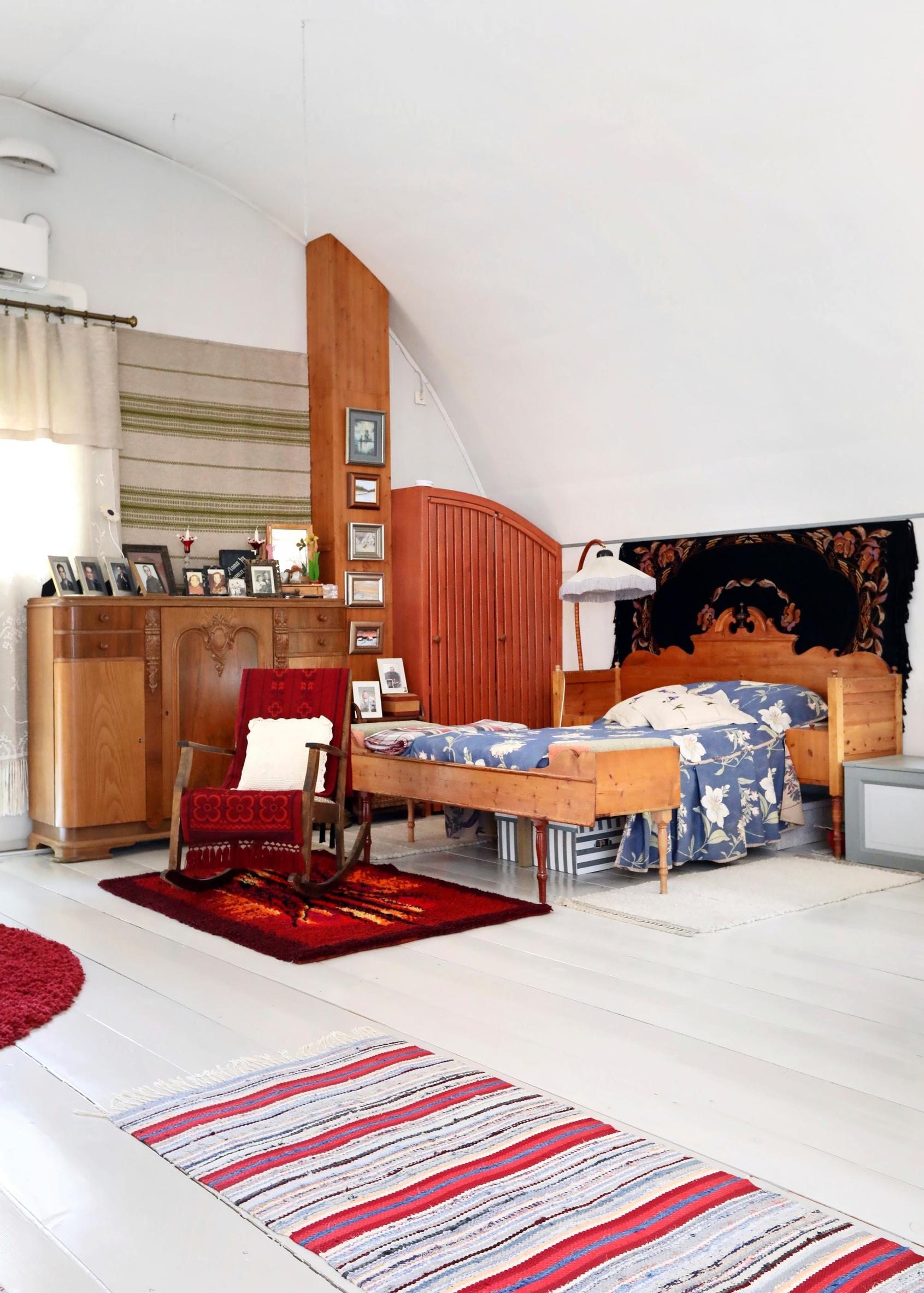 Bed made from a pull-out sofa and old cabinets