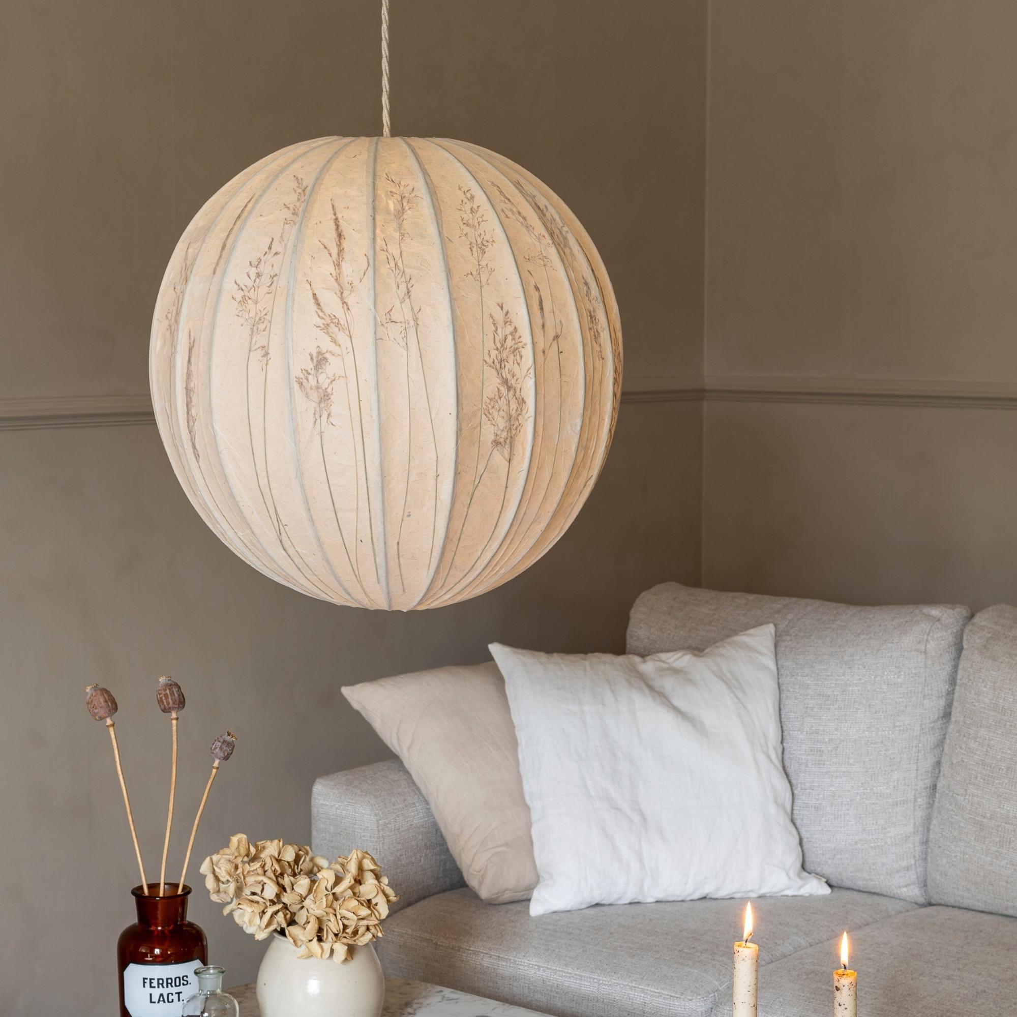 Transform a paper lampshade with autumn grasses for a soft glow