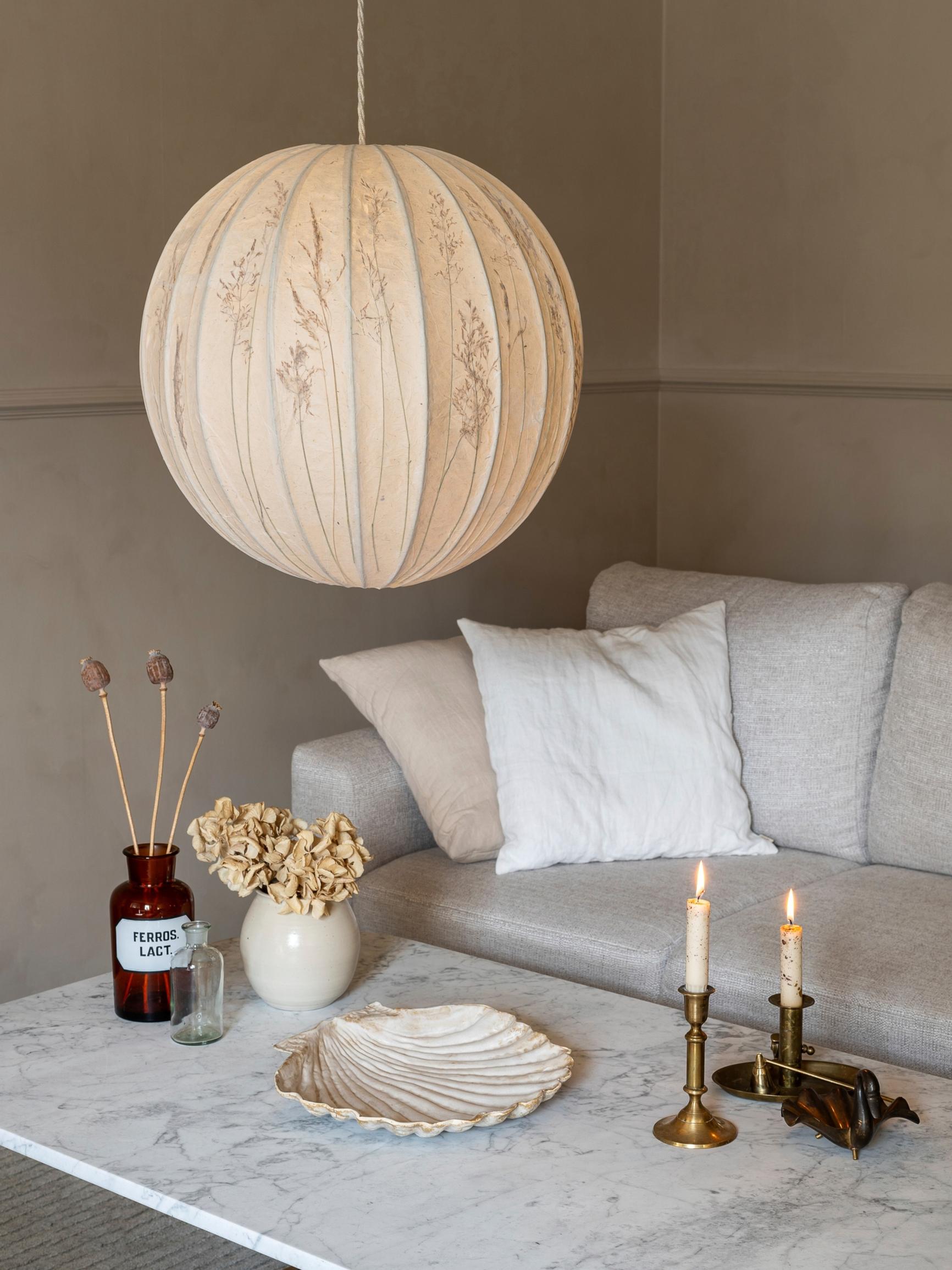 Transform a paper lampshade with autumn grasses for a soft glow