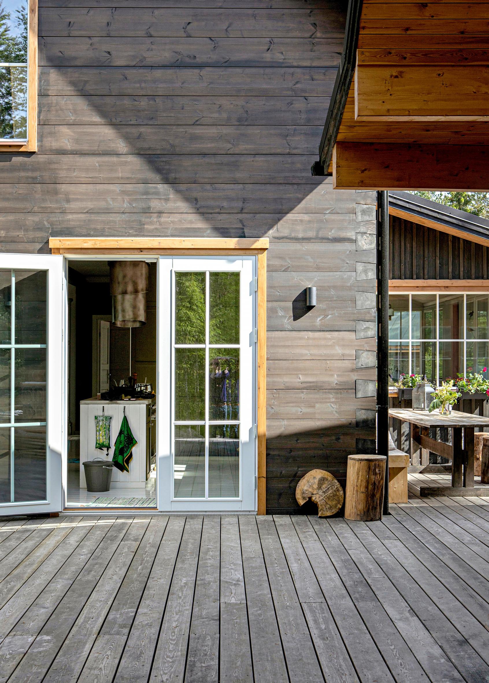A large patio for a log house.