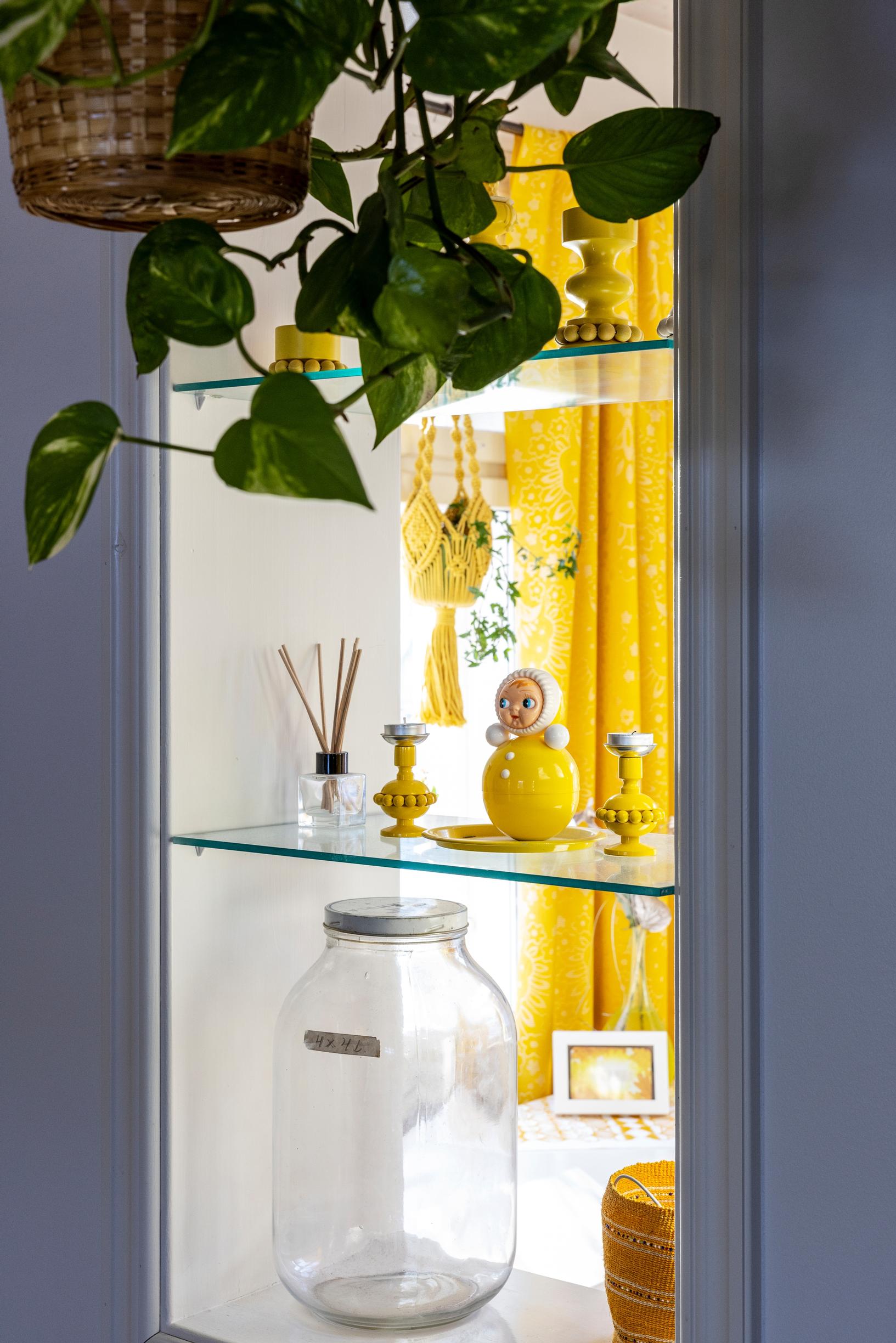 An interior window displaying decorative pieces.