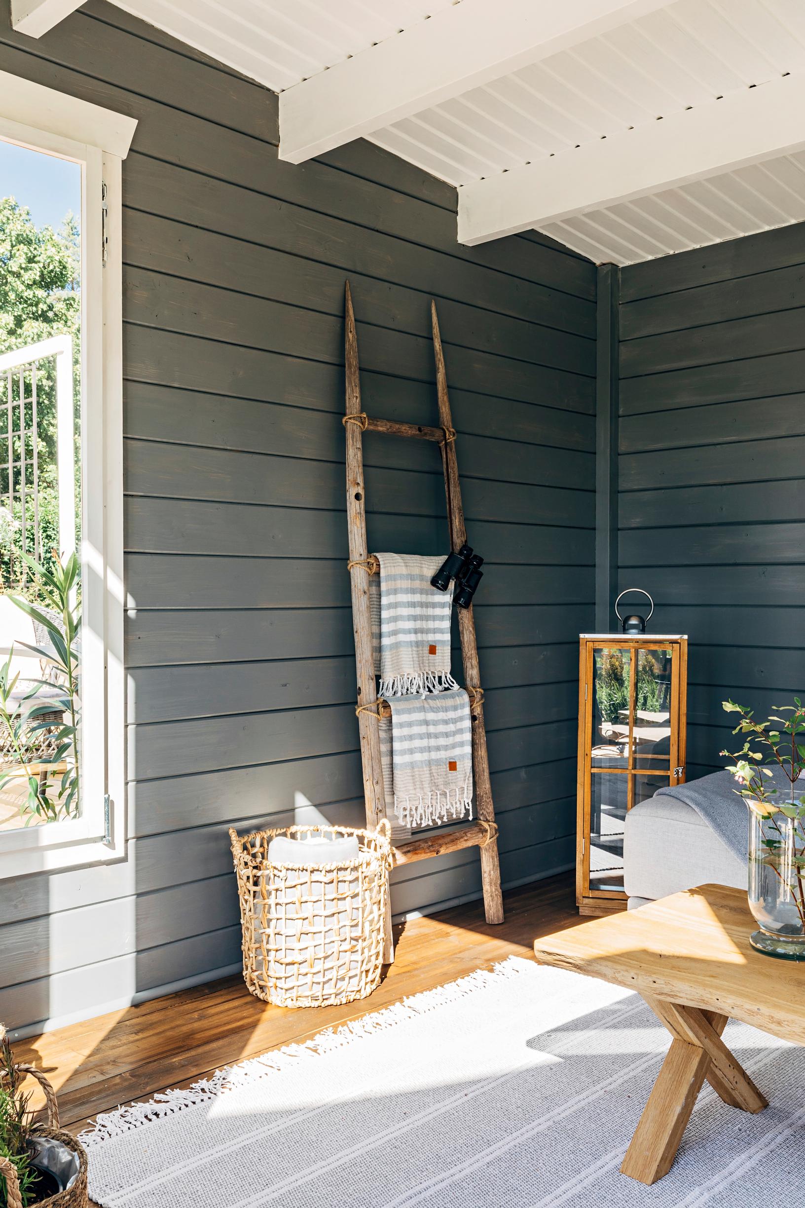 The pool house is decorated in natural hues