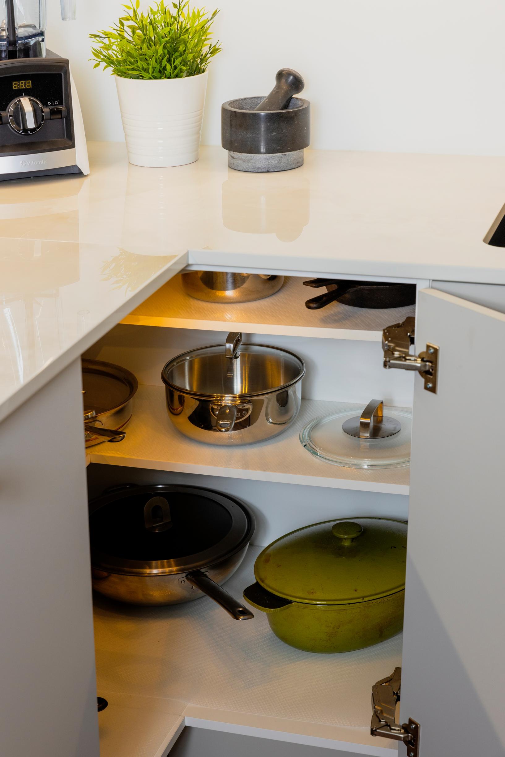 Corner cabinet with shelves and motion-sensor lights