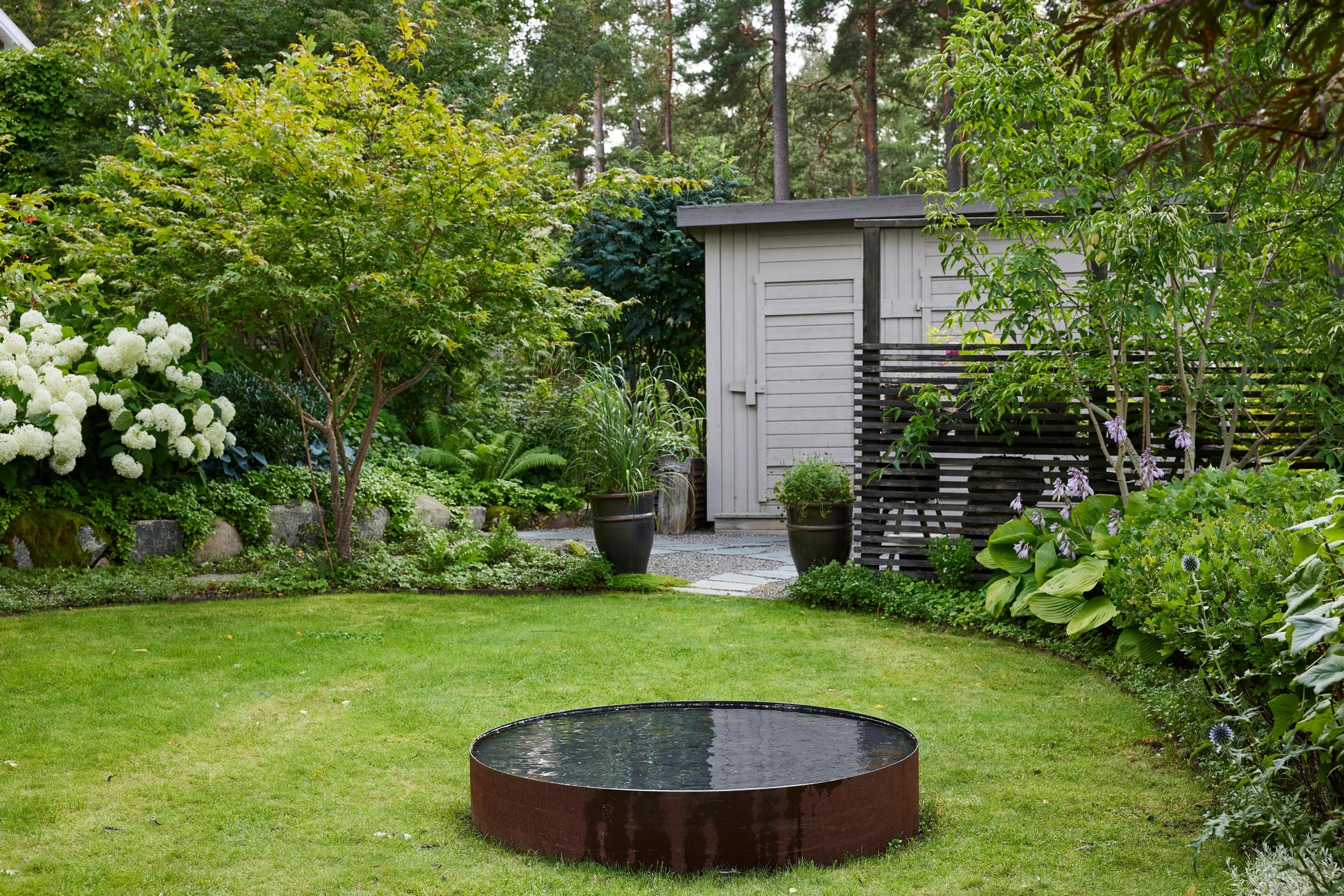 Moosegarden: a water feature placed over the septic tank cover