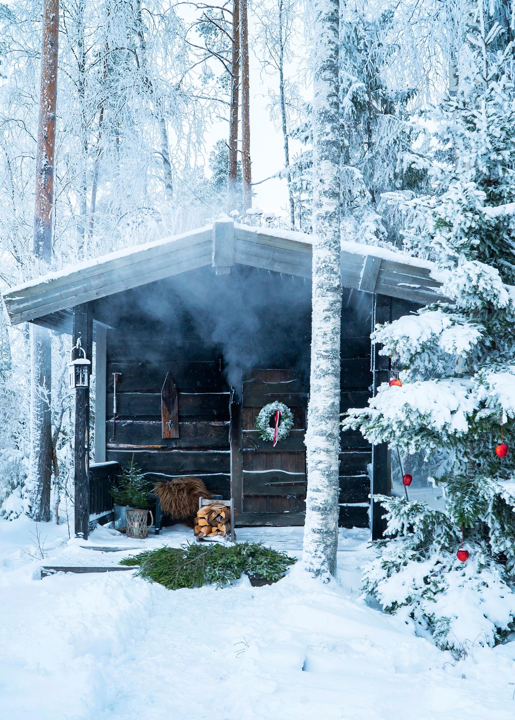 Finnish Christmas: a sauna cottage in a snowy landscape