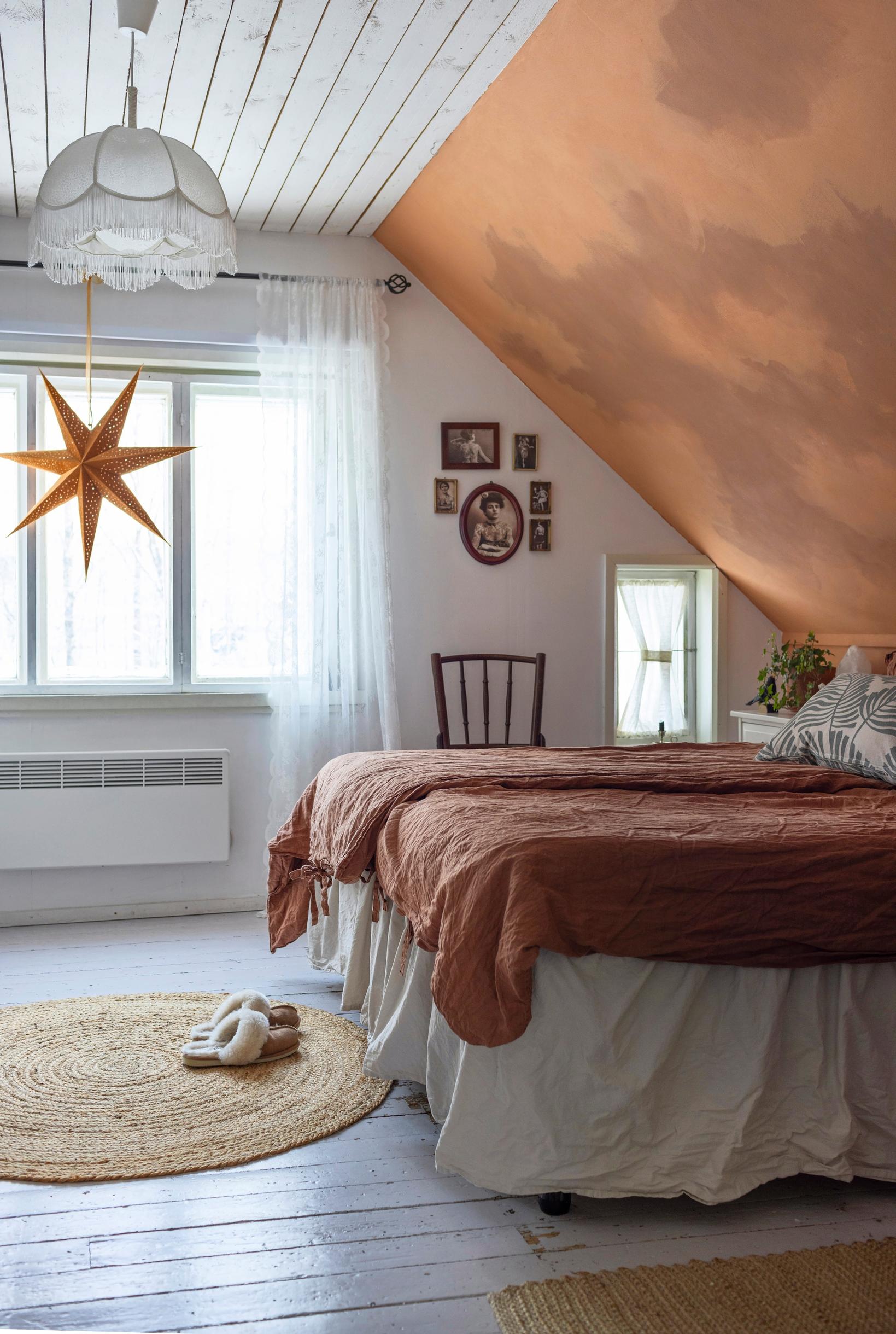 An uneven slanted ceiling in the bedroom