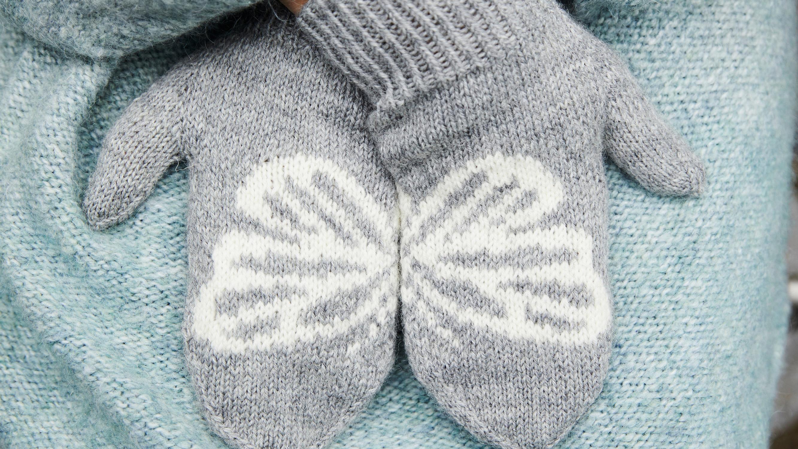 These beautiful butterfly mittens bring a piece of paradise into the dark of winter