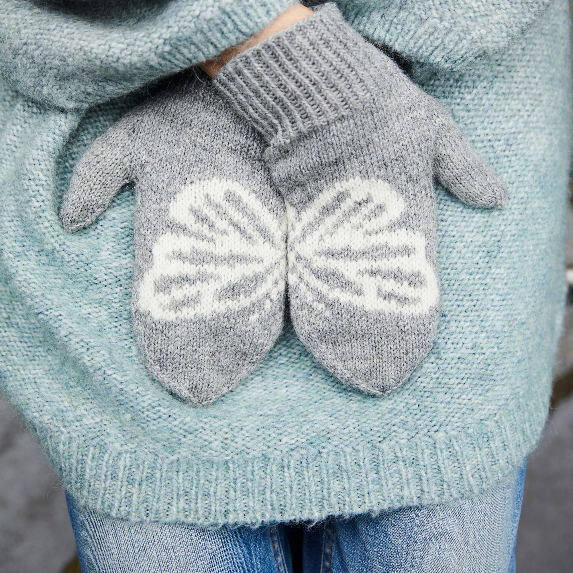 These beautiful butterfly mittens bring a piece of paradise into the dark of winter