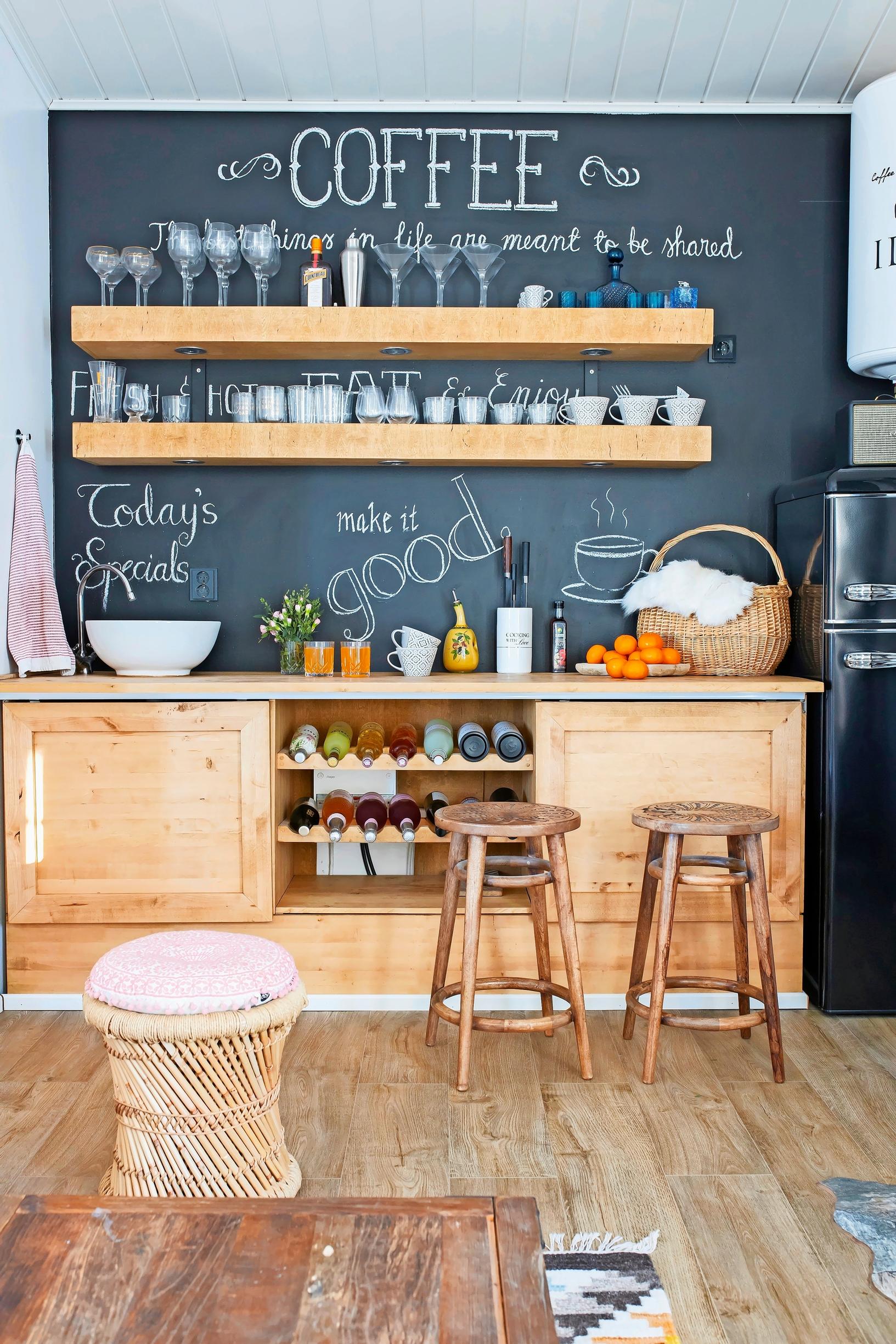 Café-style kitchen with a chalkboard wall