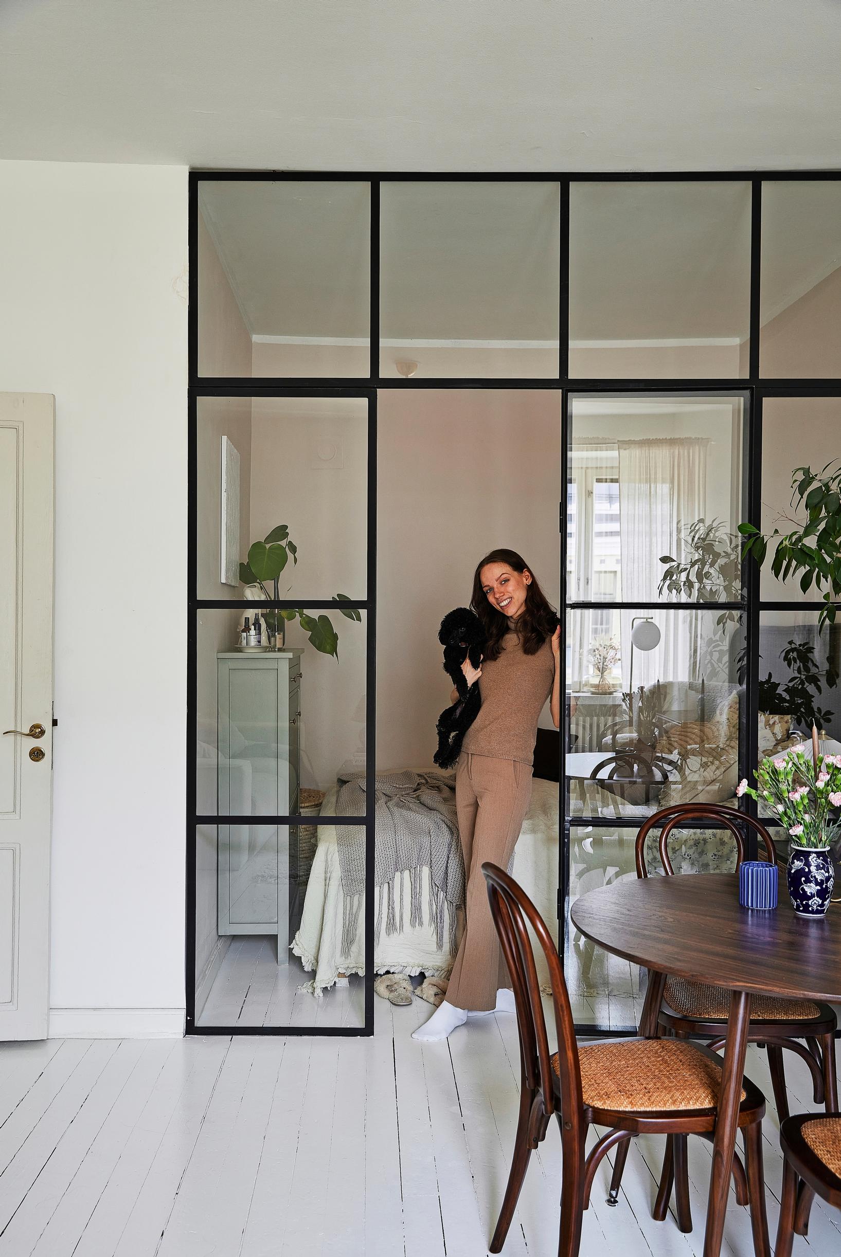 Floora Kukorelli in the alcove of her home