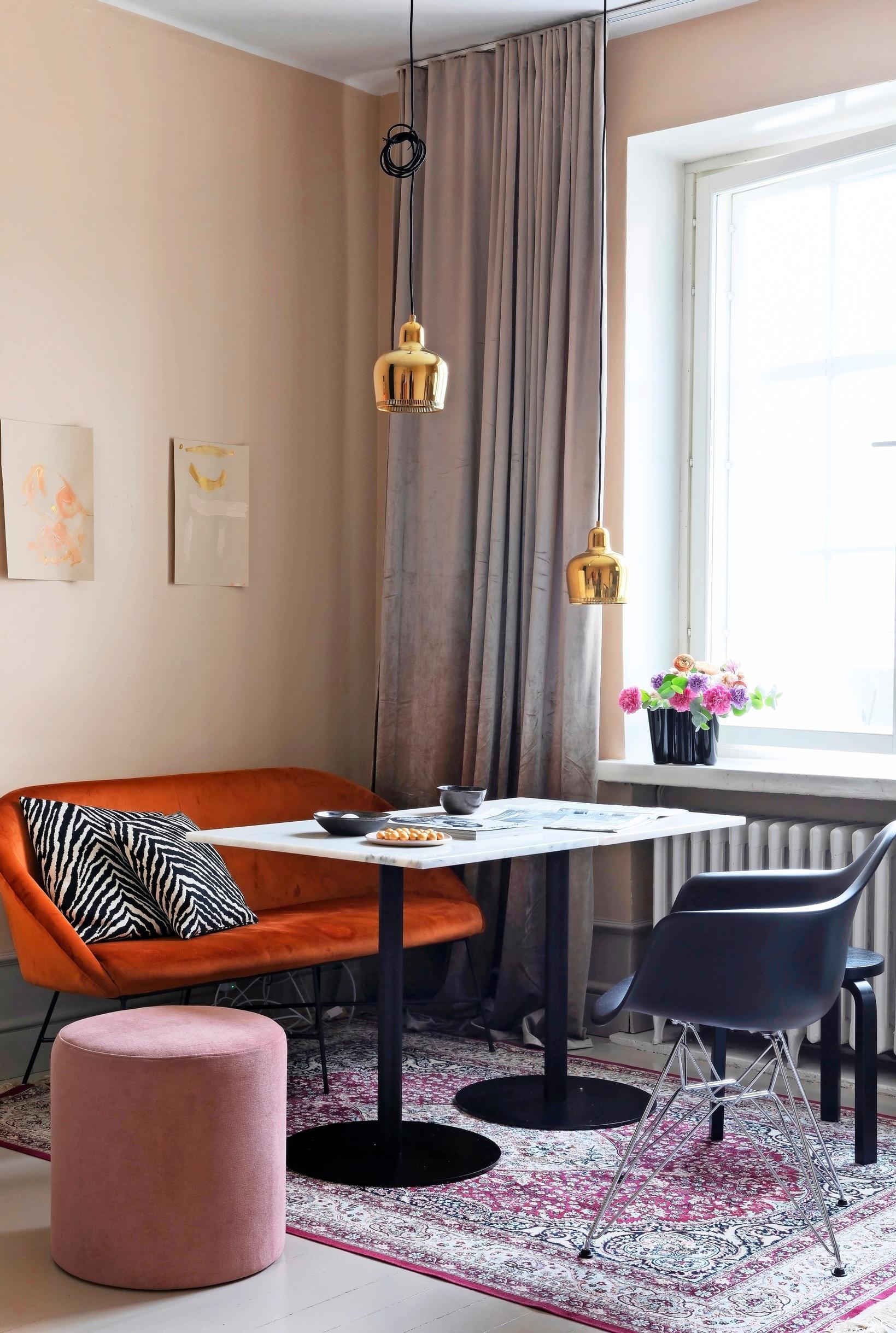 Velvet curtains in a café-style lounge nook