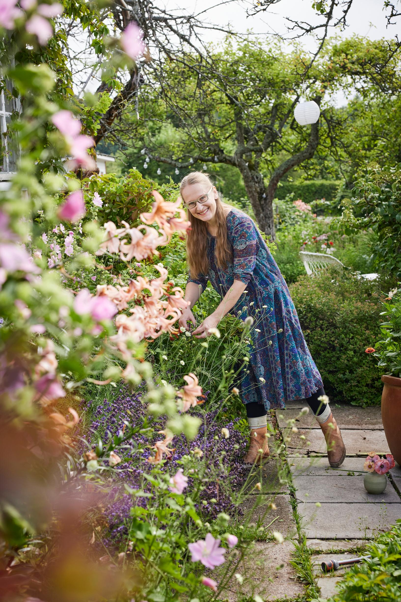 Satu Koivisto in her garden