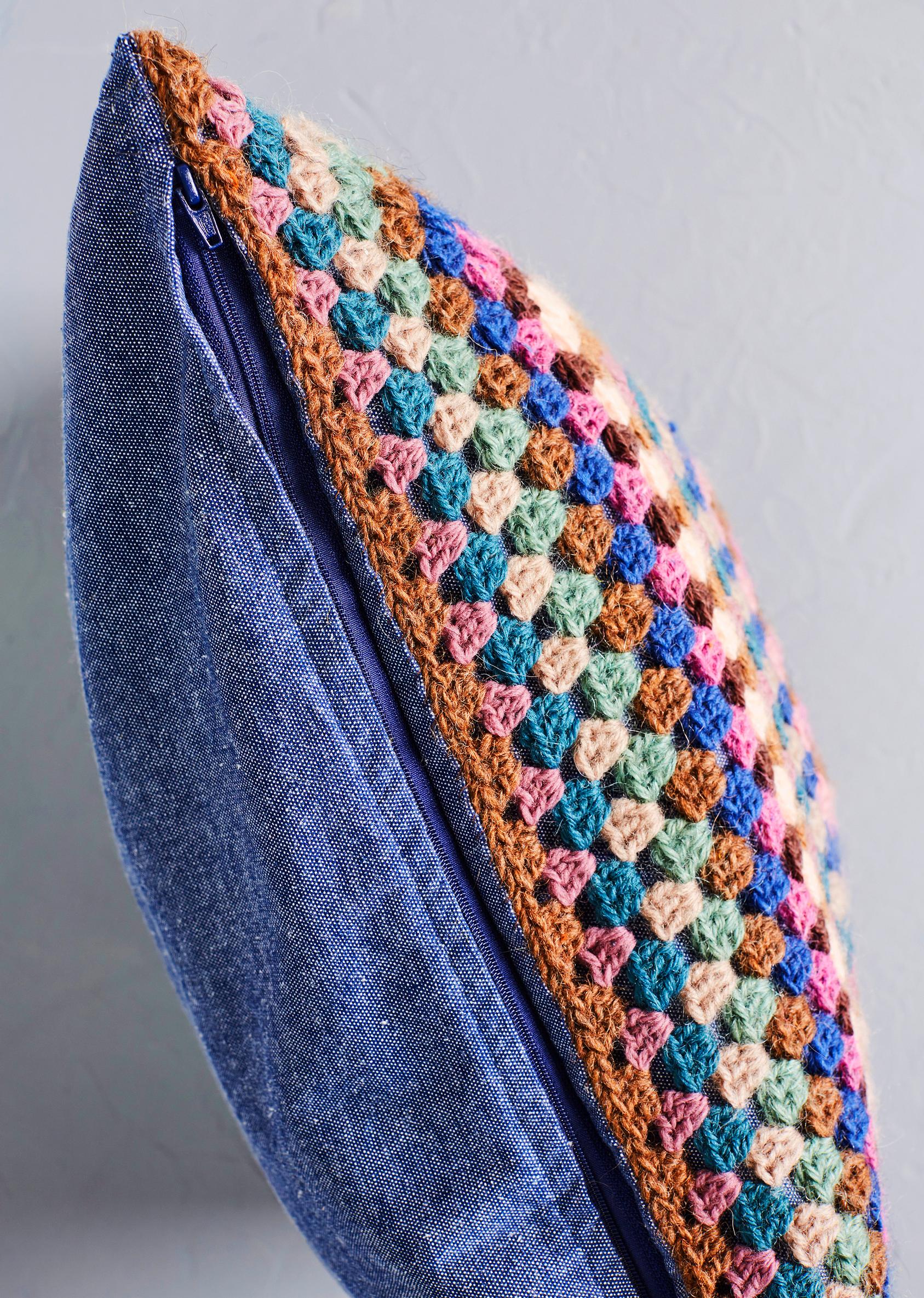 Granny square sewn onto the pillow cover
