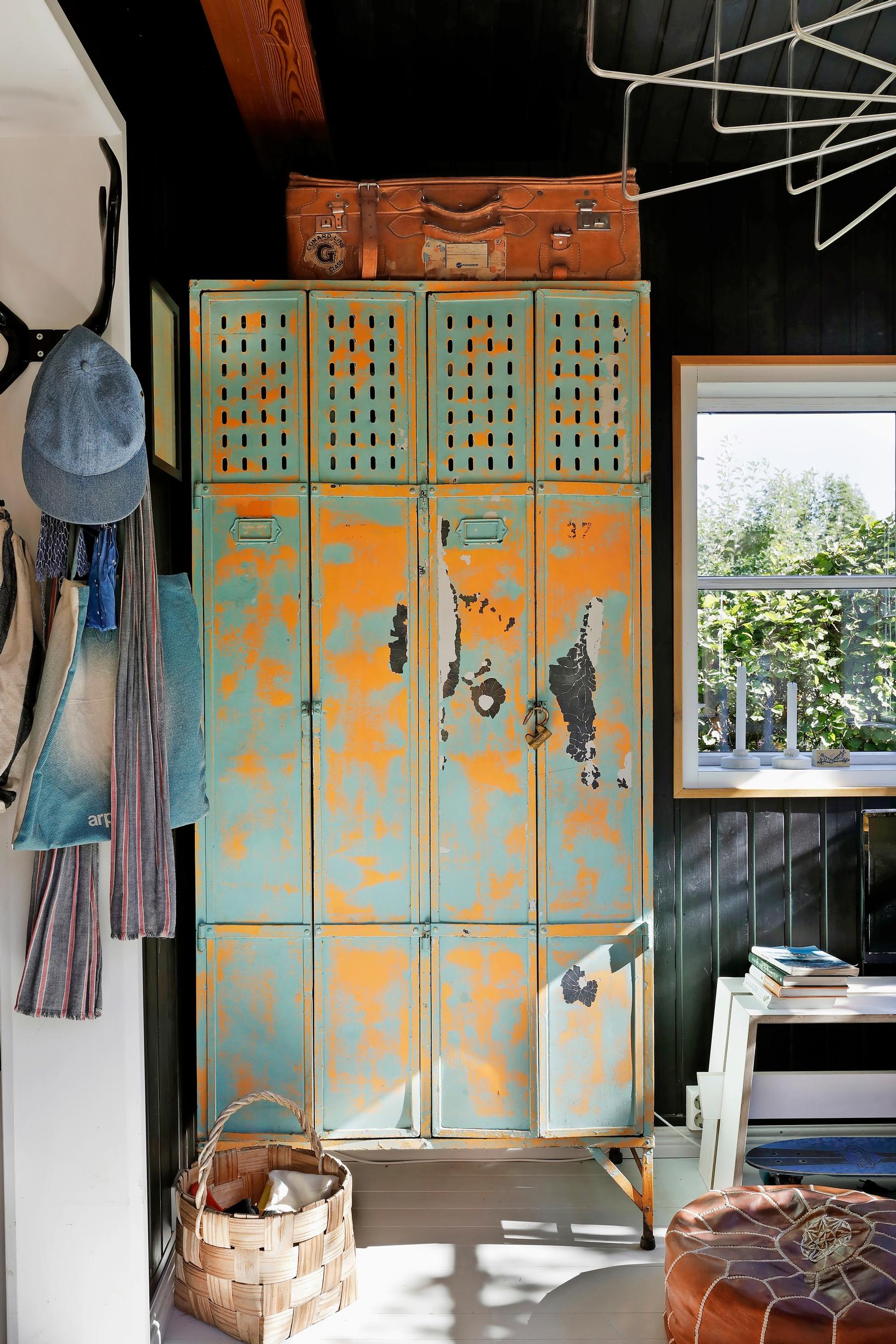 An old metal locker on the cottage porch.