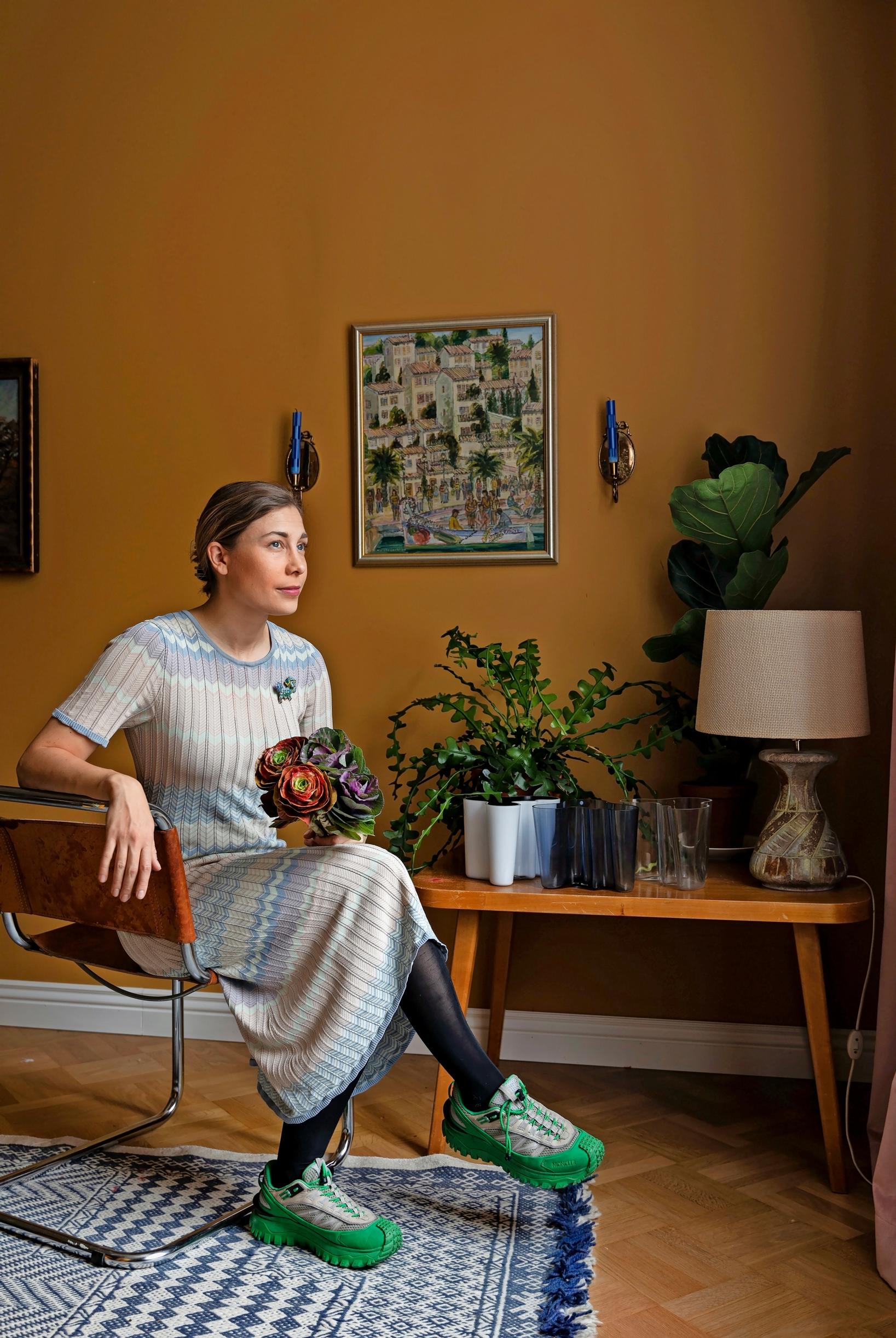 Image of a woman in her living room.