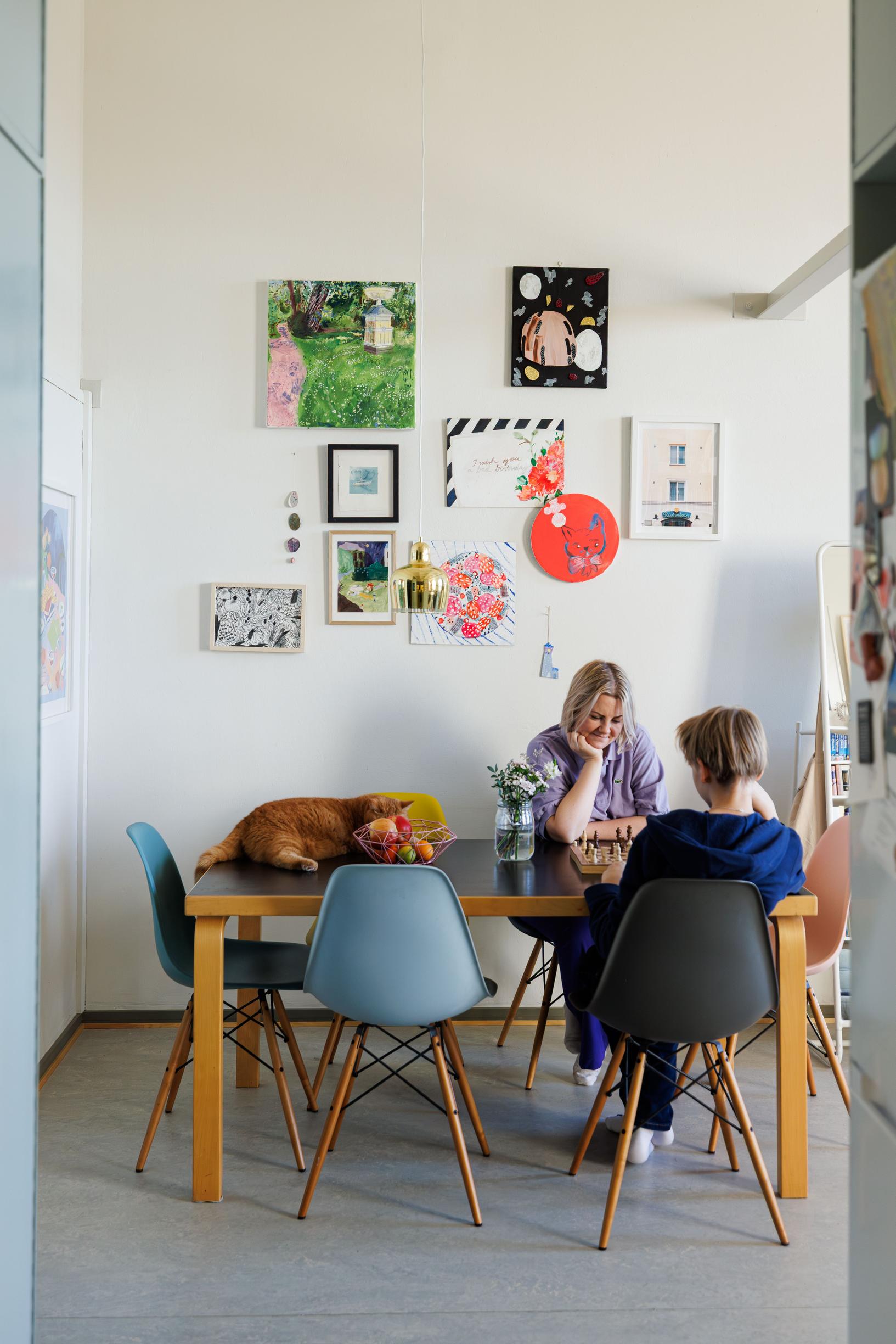 paintings on the dining room wall