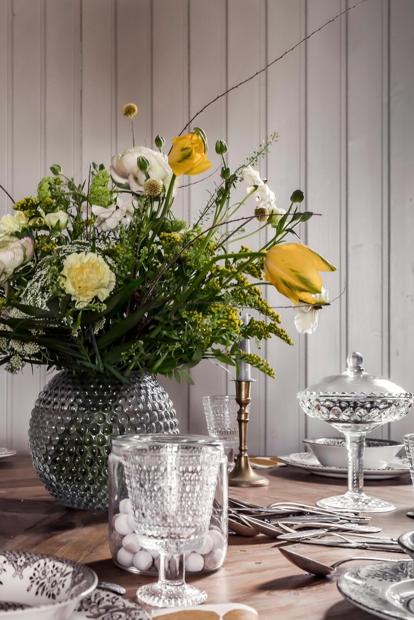 a bouquet of flowers on the table