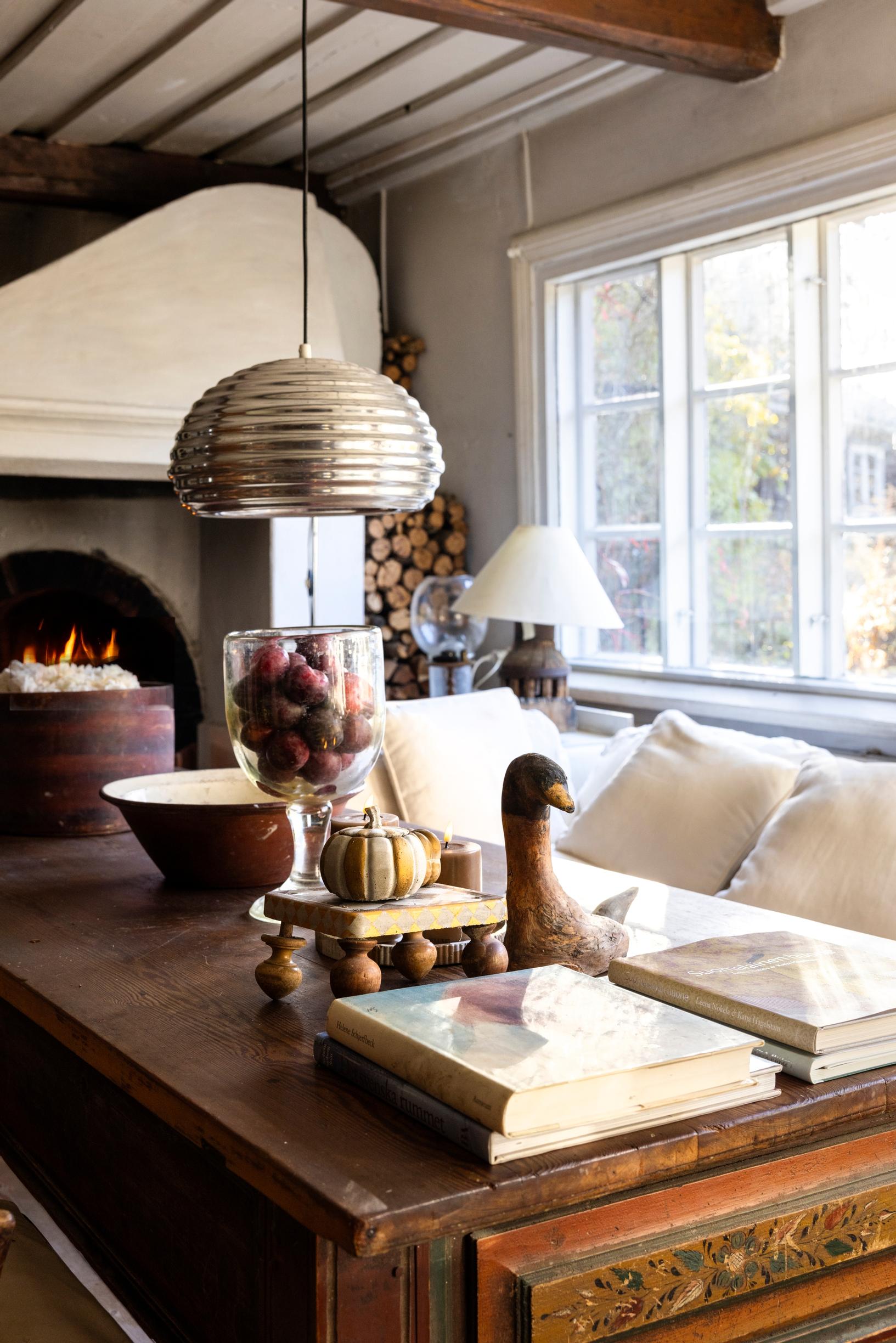 A coffee table adorned with decorative objects and books.