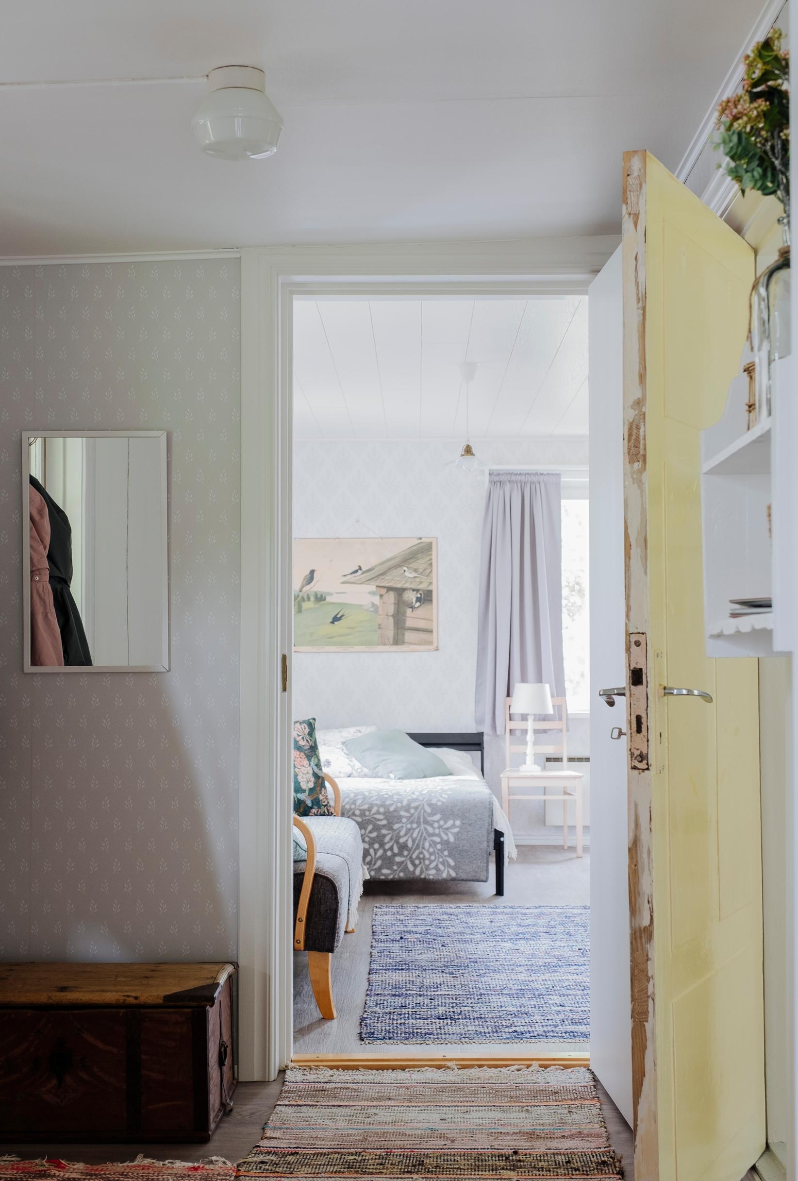 view through a doorway into a bedroom