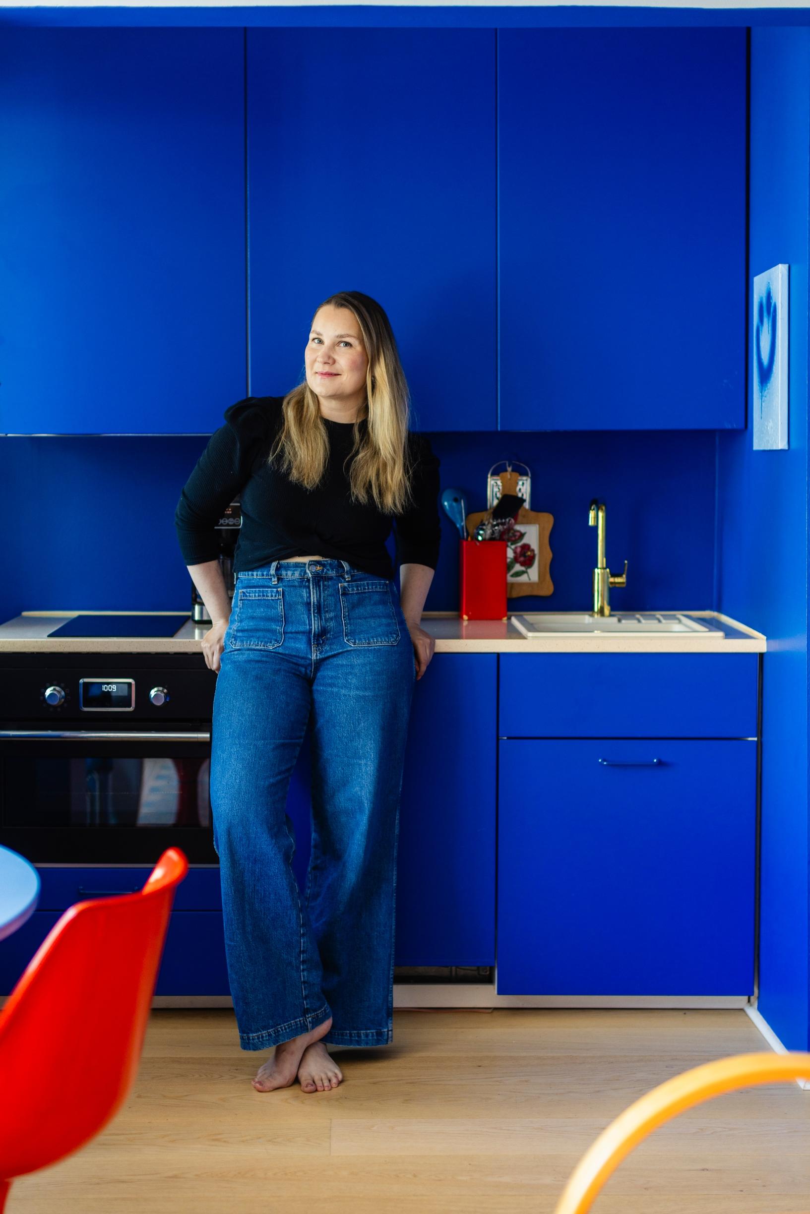 Irene Naakka stands in her kitchen