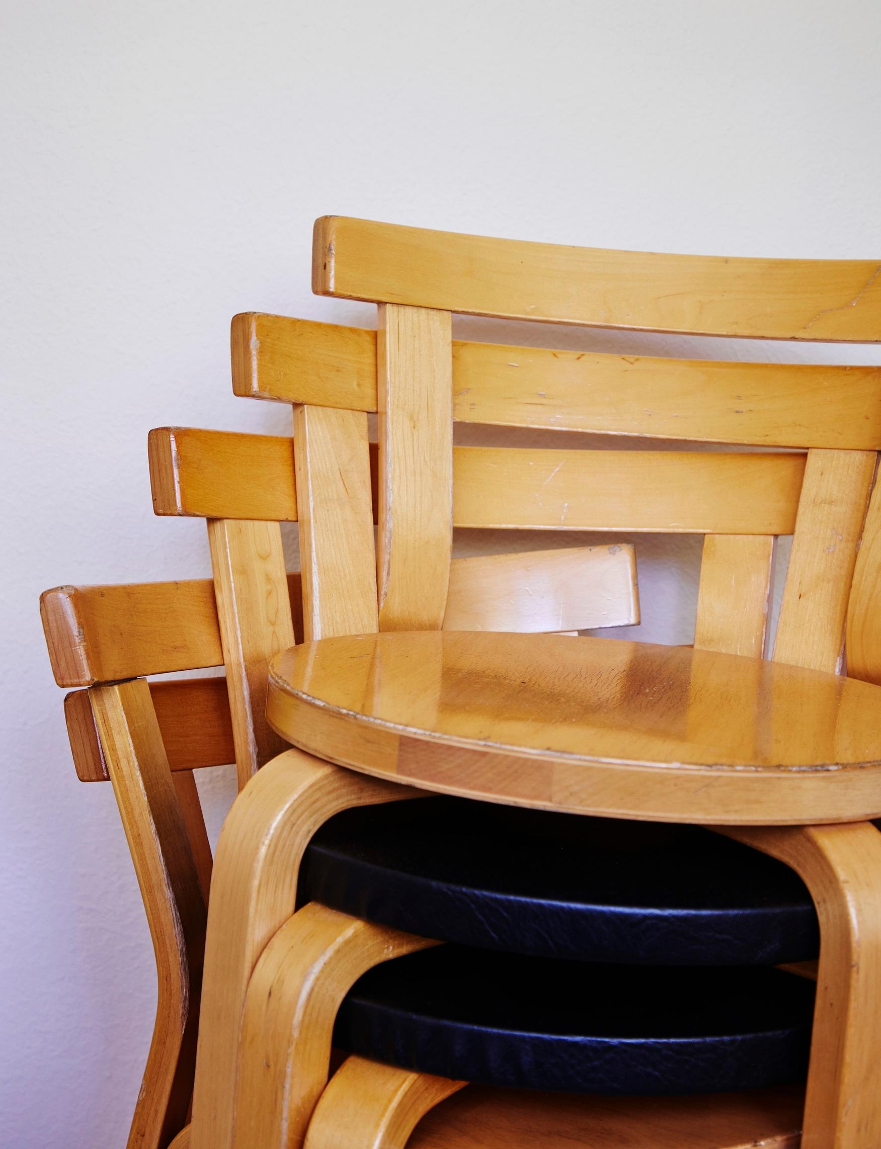 Alvar Aalto’s model 68 chairs stack into a small space
