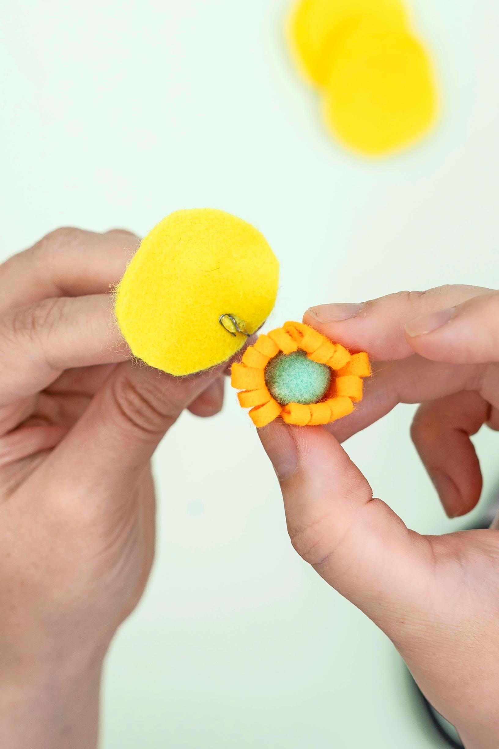 Attach the petals around the flower center.