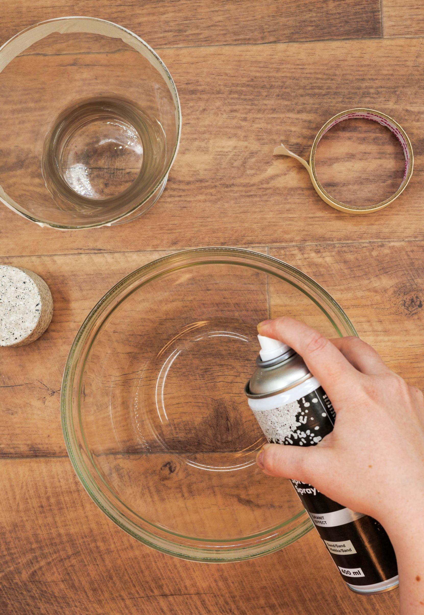 Spray paint the inside of the dishes.