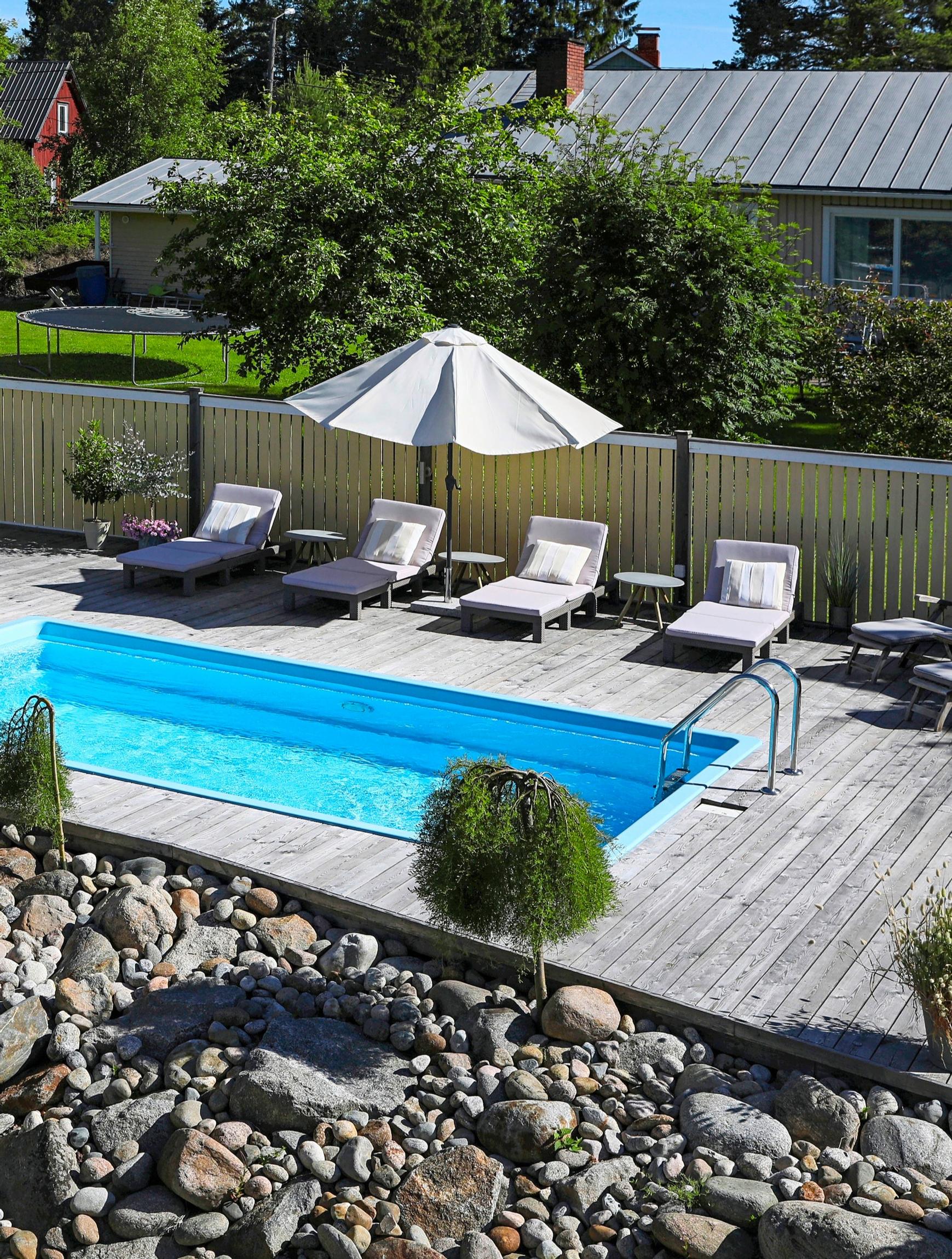 A patio reminiscent of a hotel pool area.