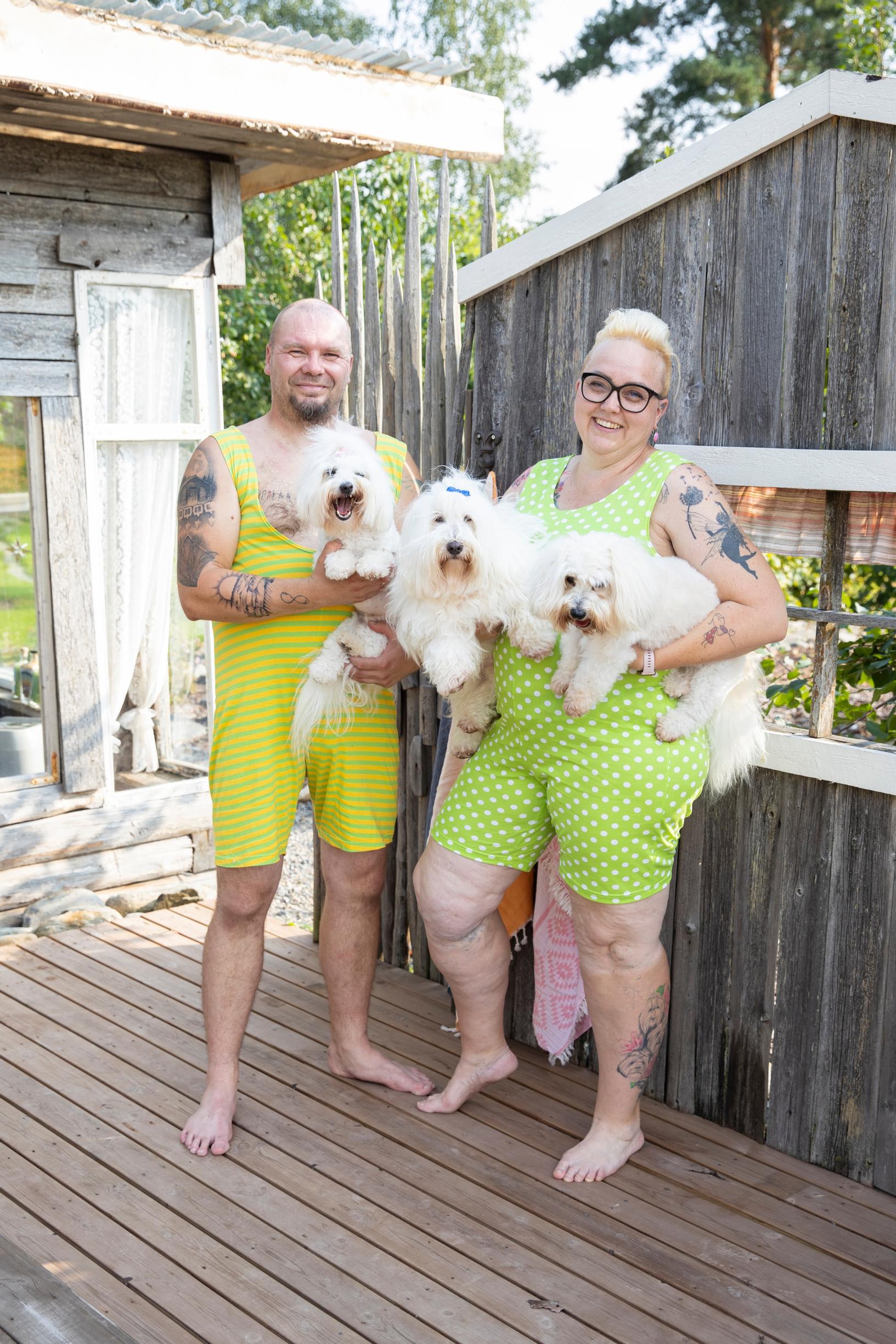 Päivi and Raine Färm with their dogs