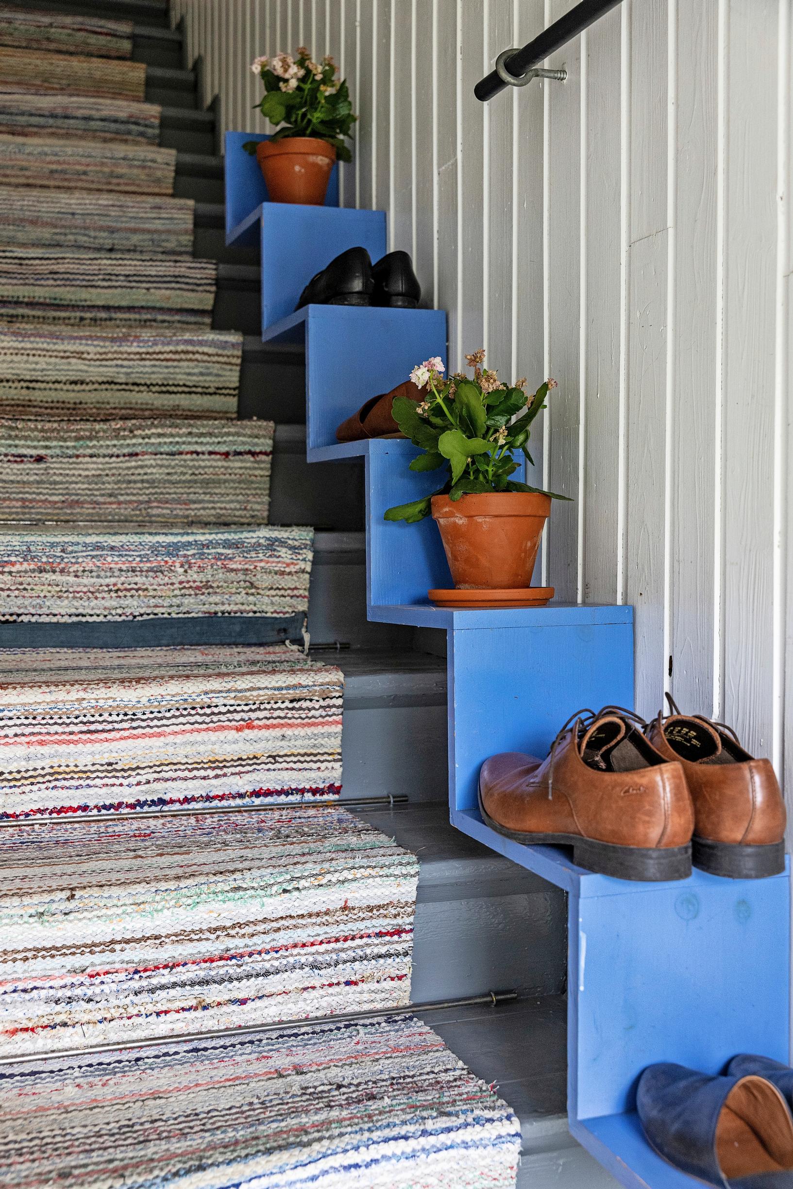 DIY shoe shelf built into the stairs